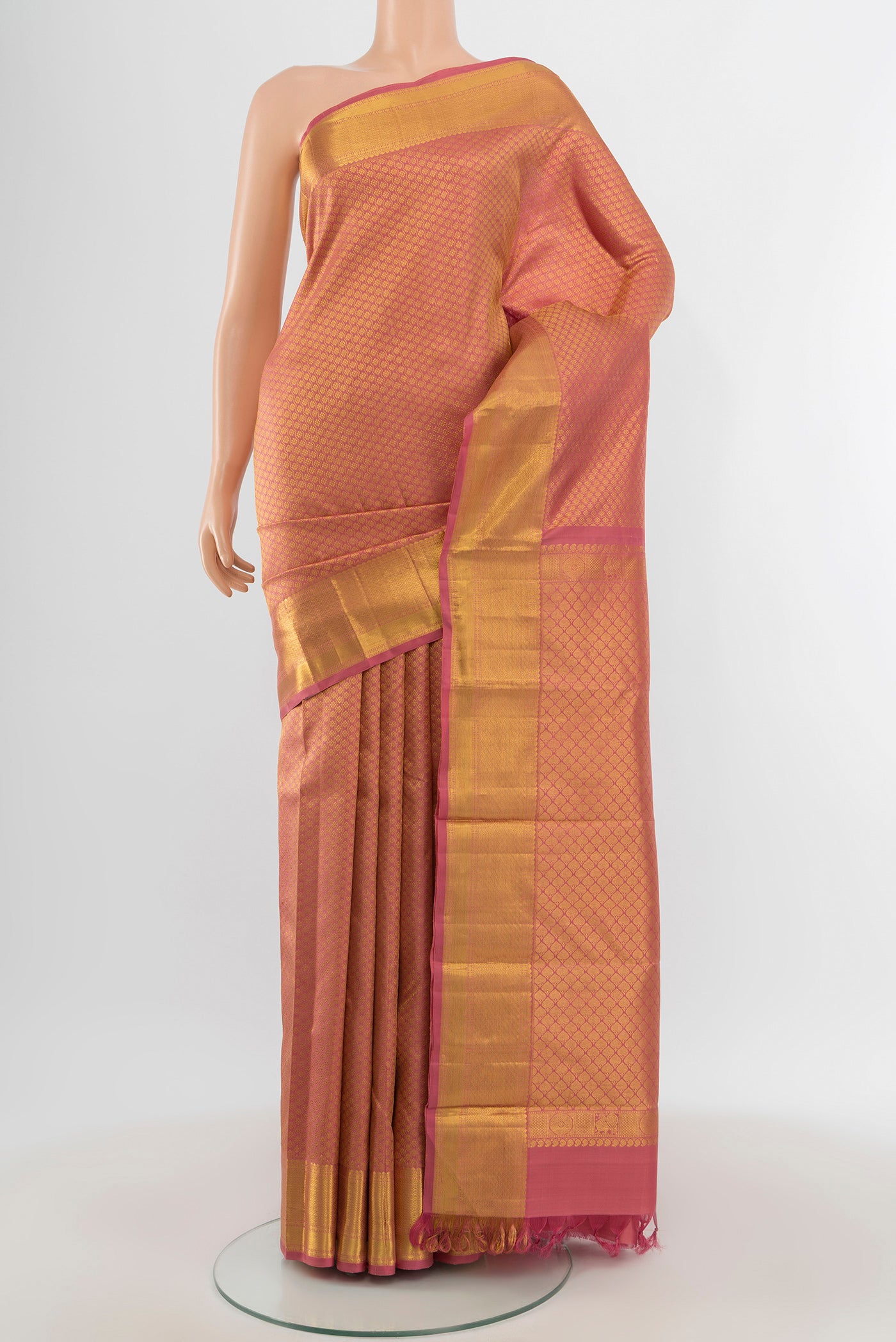 Pink Kanchipuram Silk Saree with Zari Brocade on the body and Zari Border.  displayed on a mannequin