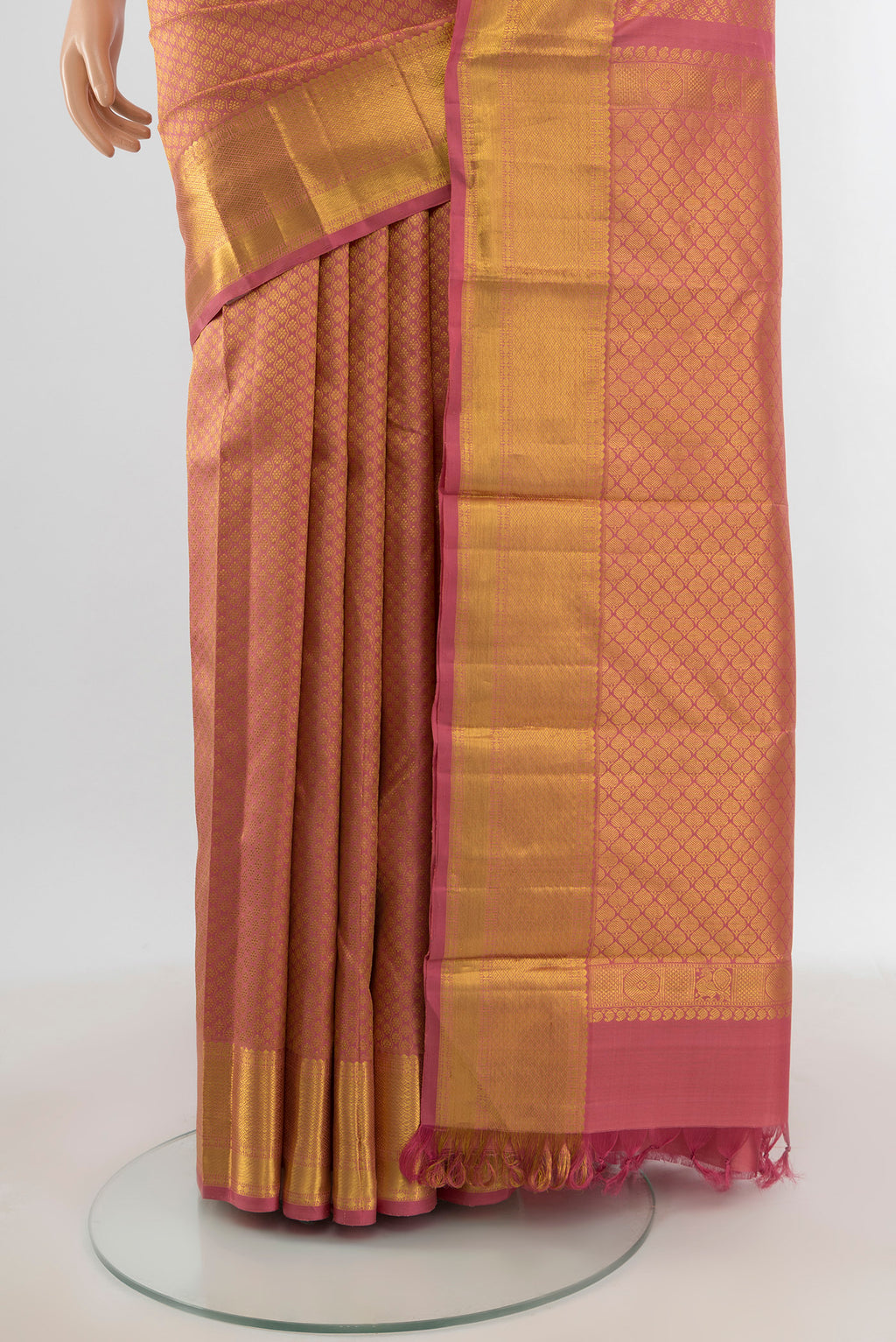 Pleats and pallu of Pink Kanchipuram Silk Saree with Zari Brocade on the body and Zari Border. 