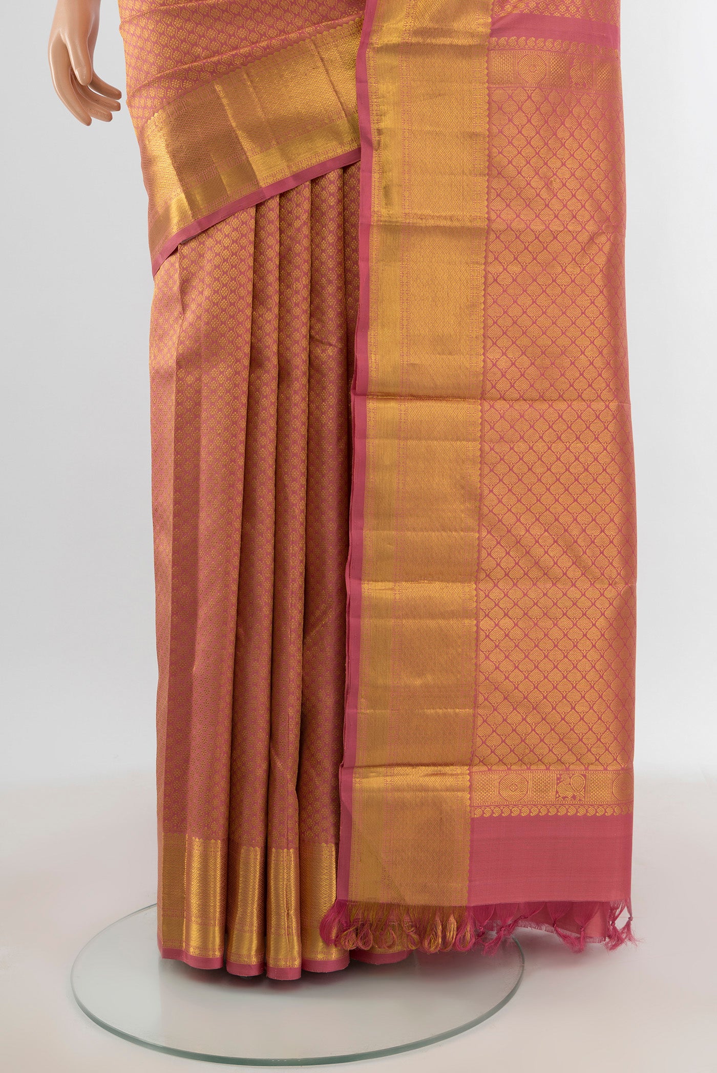 Pleats and pallu of Pink Kanchipuram Silk Saree with Zari Brocade on the body and Zari Border. 