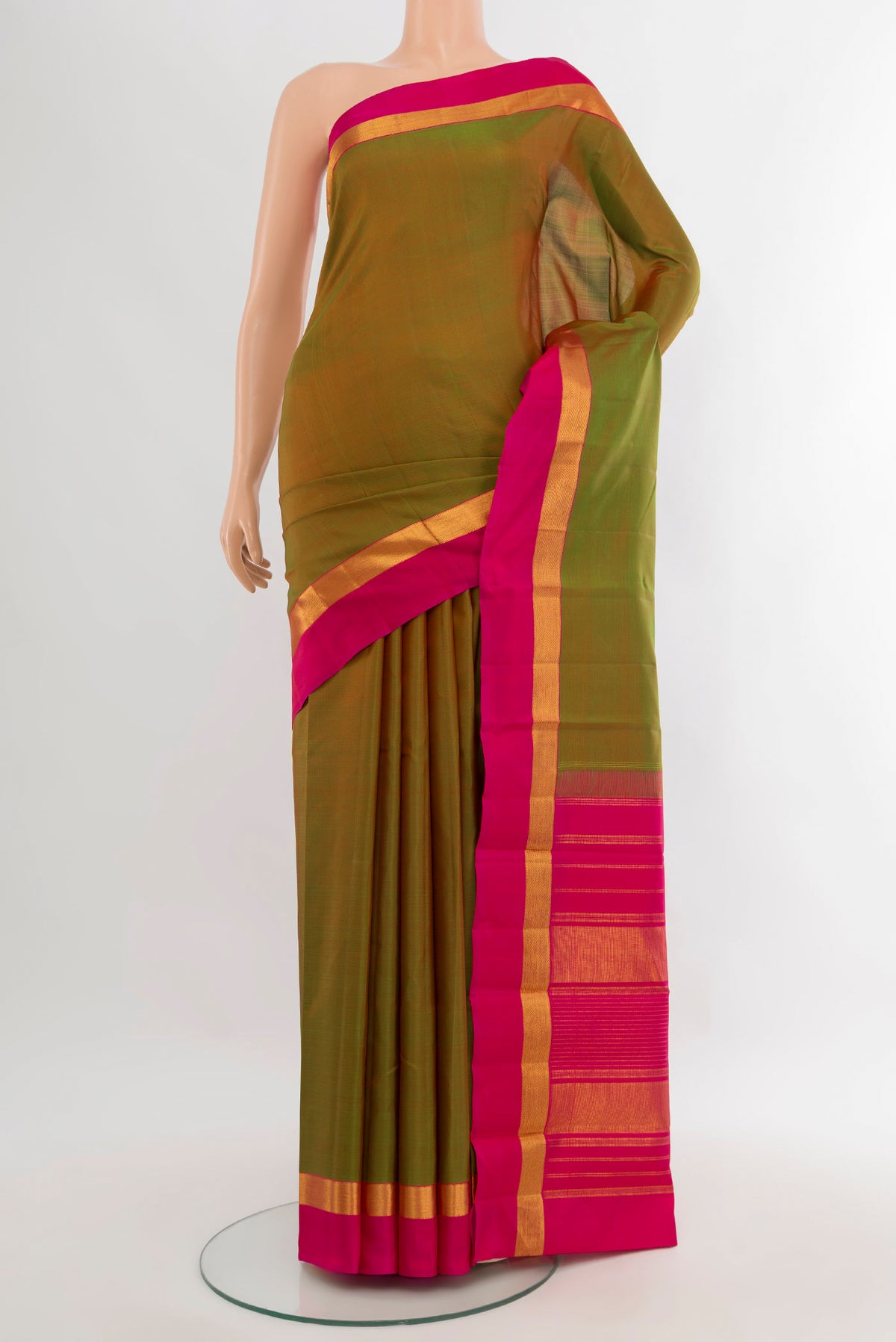 Mehandi Green Dual Tone Kanjivaram Silk Saree with Plain Body and Zari Border.  displayed on a mannequin
