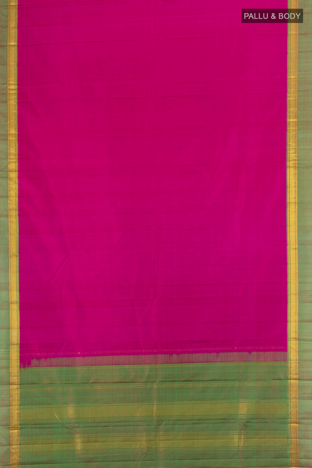 Flat view of Rani Pink Kanjivaram Silk Saree with Plain Body and Zari Border. 