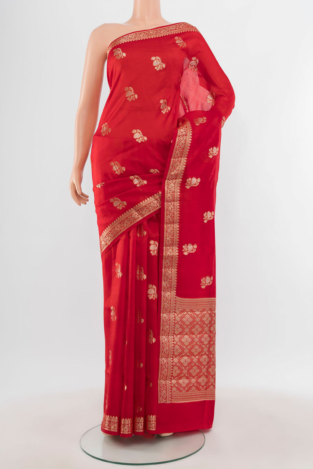 Red Banarasi Raw Silk Saree with Zari Butta on the body and Zari Border.  displayed on a mannequin