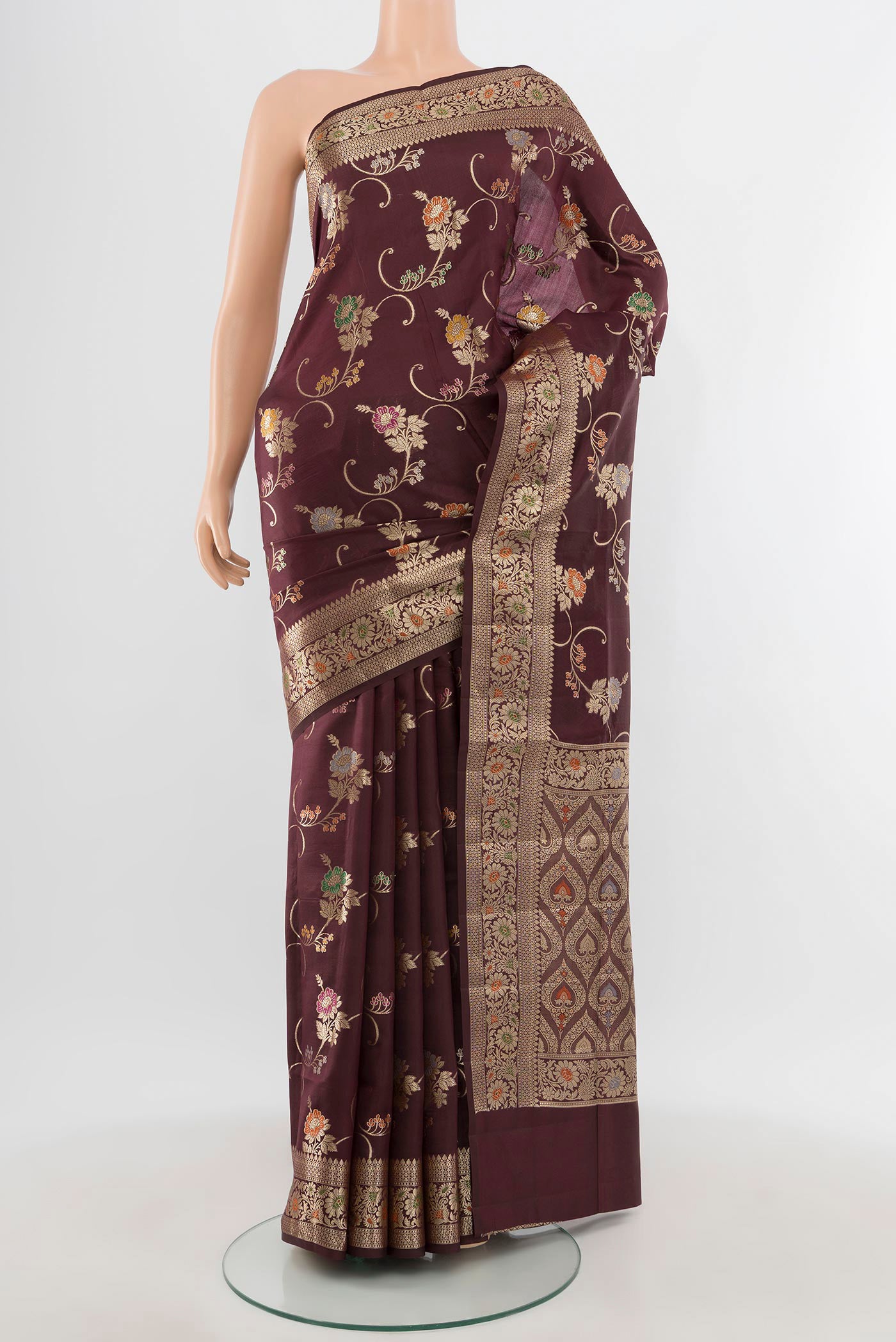 Coffee Brown Banarasi Raw Silk Saree with Zari Butta on the body and Zari Border.  displayed on a mannequin