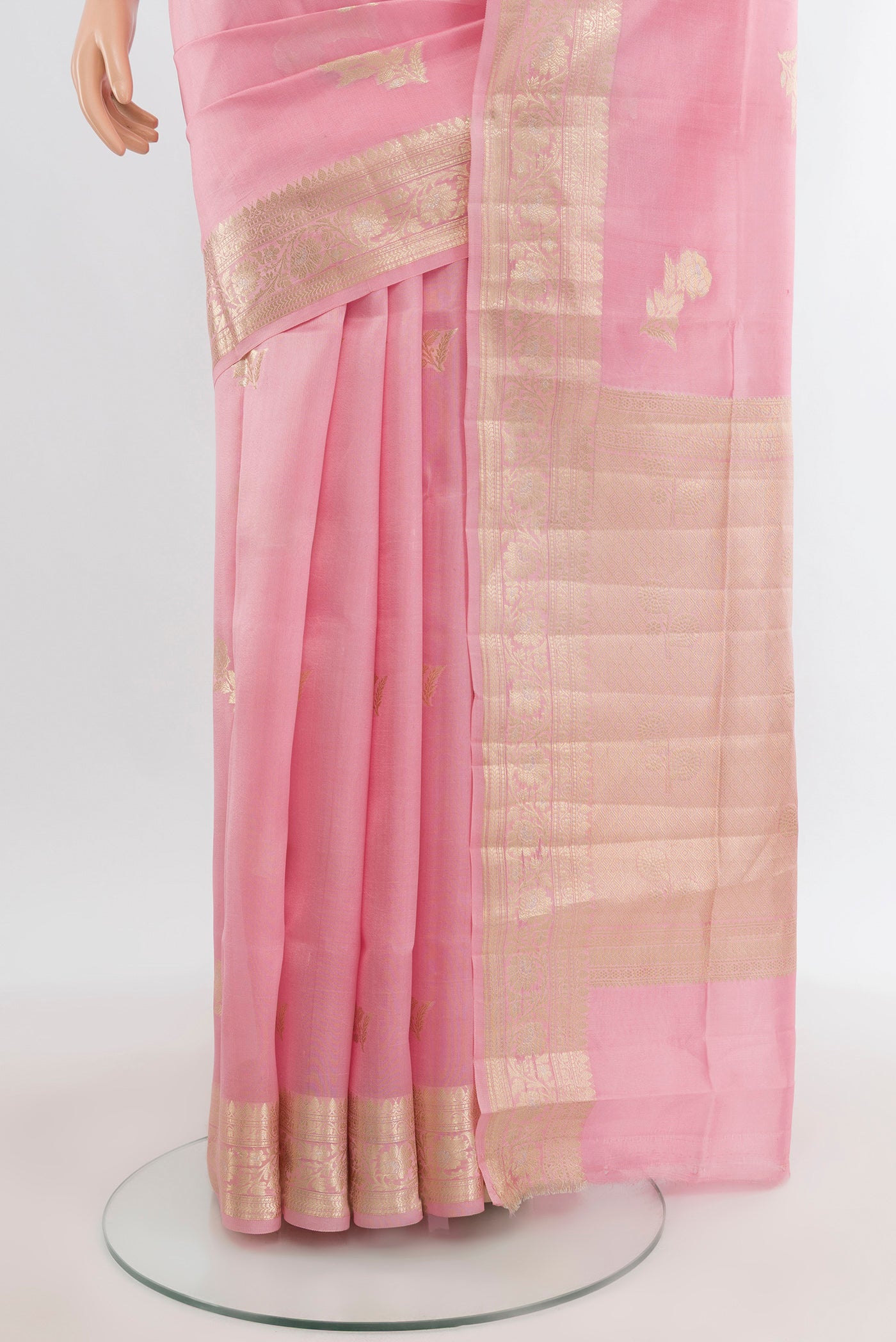 Pleats and pallu of Rose pink Banarasi Raw Silk Saree with Zari Butta on the body and Zari Border. 