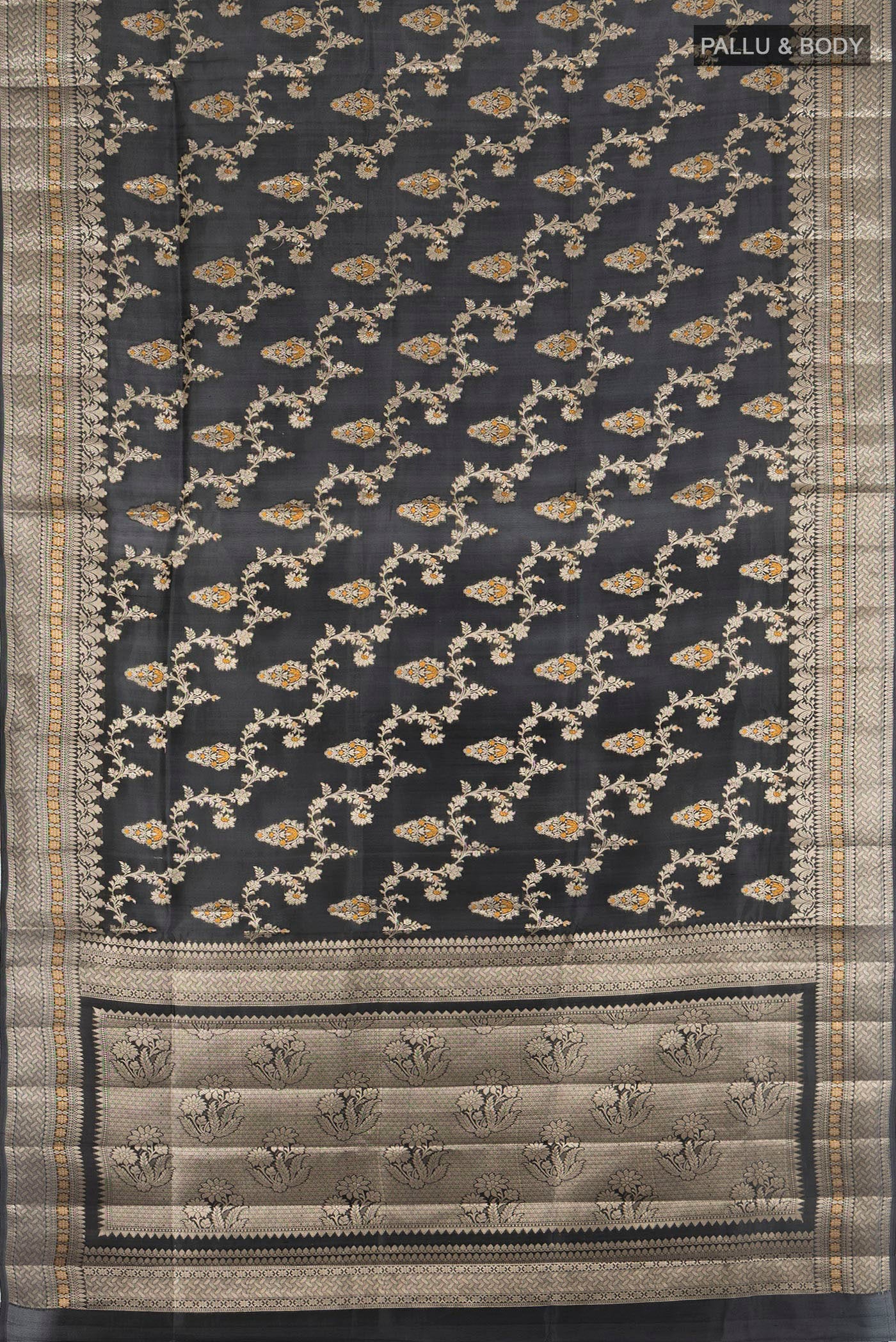 Flat view of Black Banarasi Raw Silk Saree with Zari And Thread Butta on the body and Zari Border. 