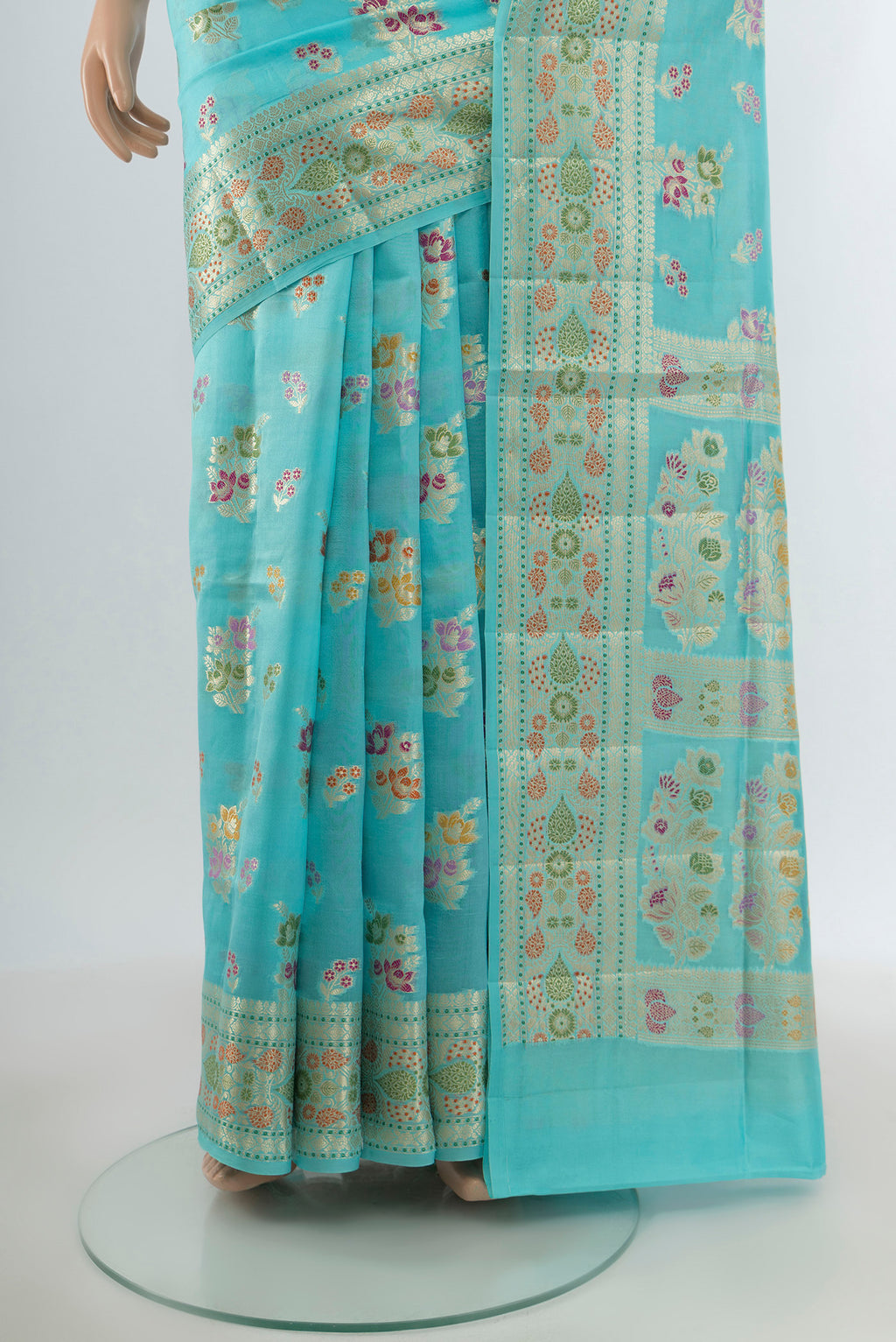 Pleats and pallu of Sky Blue Banarasi Raw Silk Saree with Zari And Thread Butta on the body and Zari Border. 