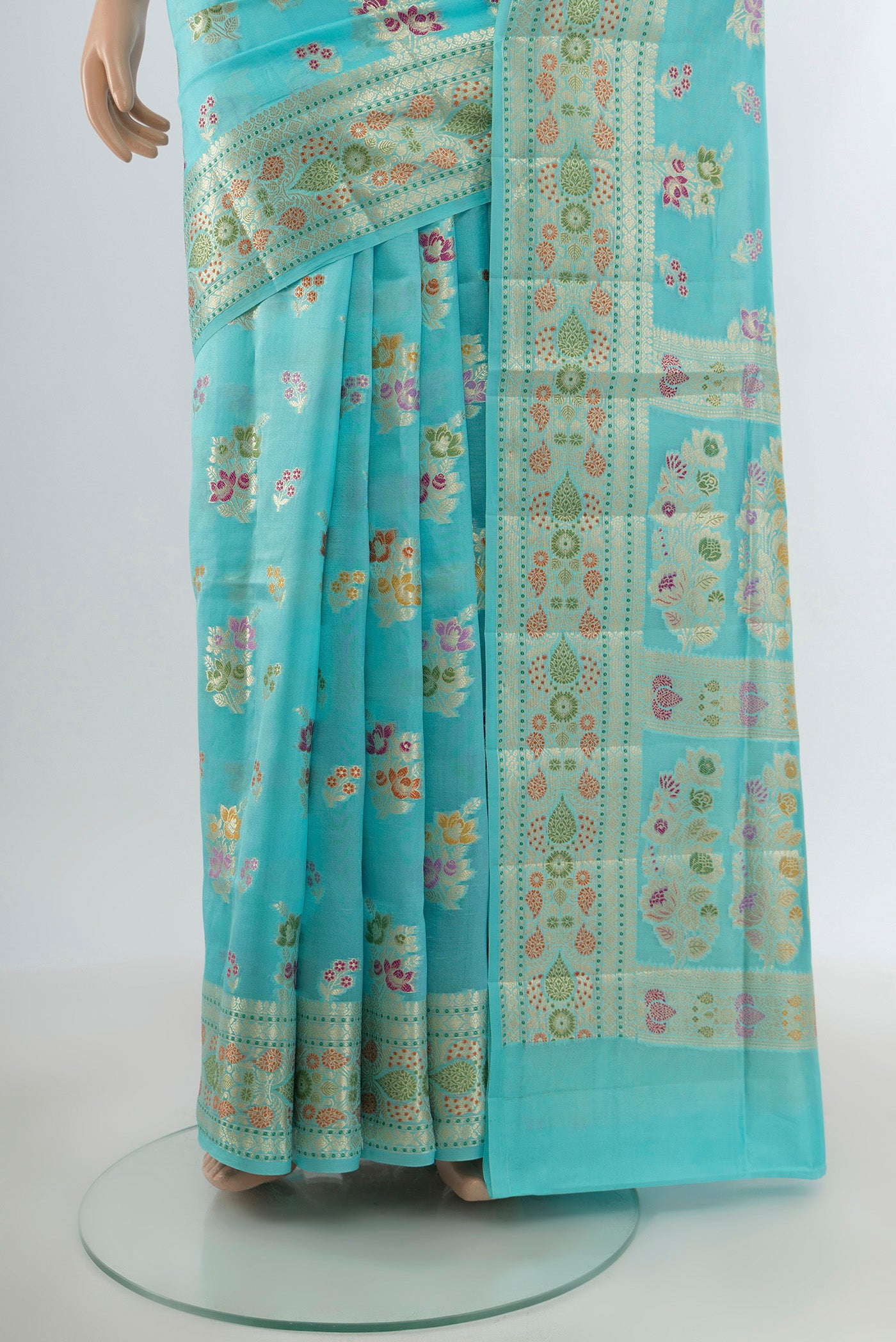 Pleats and pallu of Sky Blue Banarasi Raw Silk Saree with Zari And Thread Butta on the body and Zari Border. 