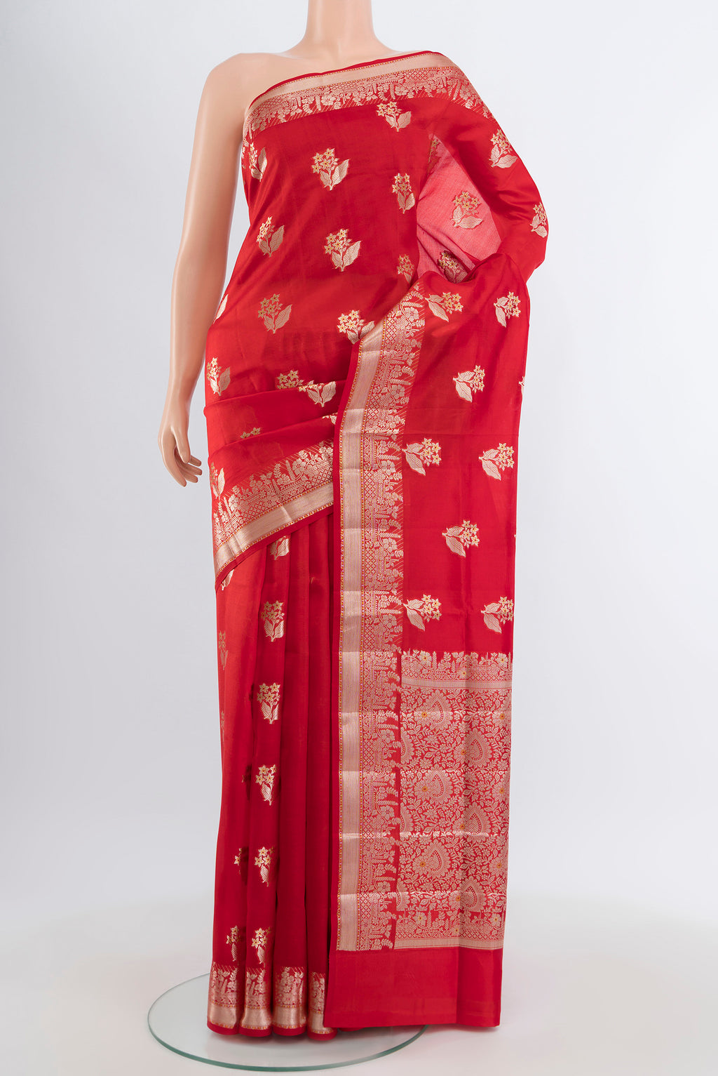 Red Banarasi Raw Silk Saree with Zari Butta on the body and Zari Border.  displayed on a mannequin