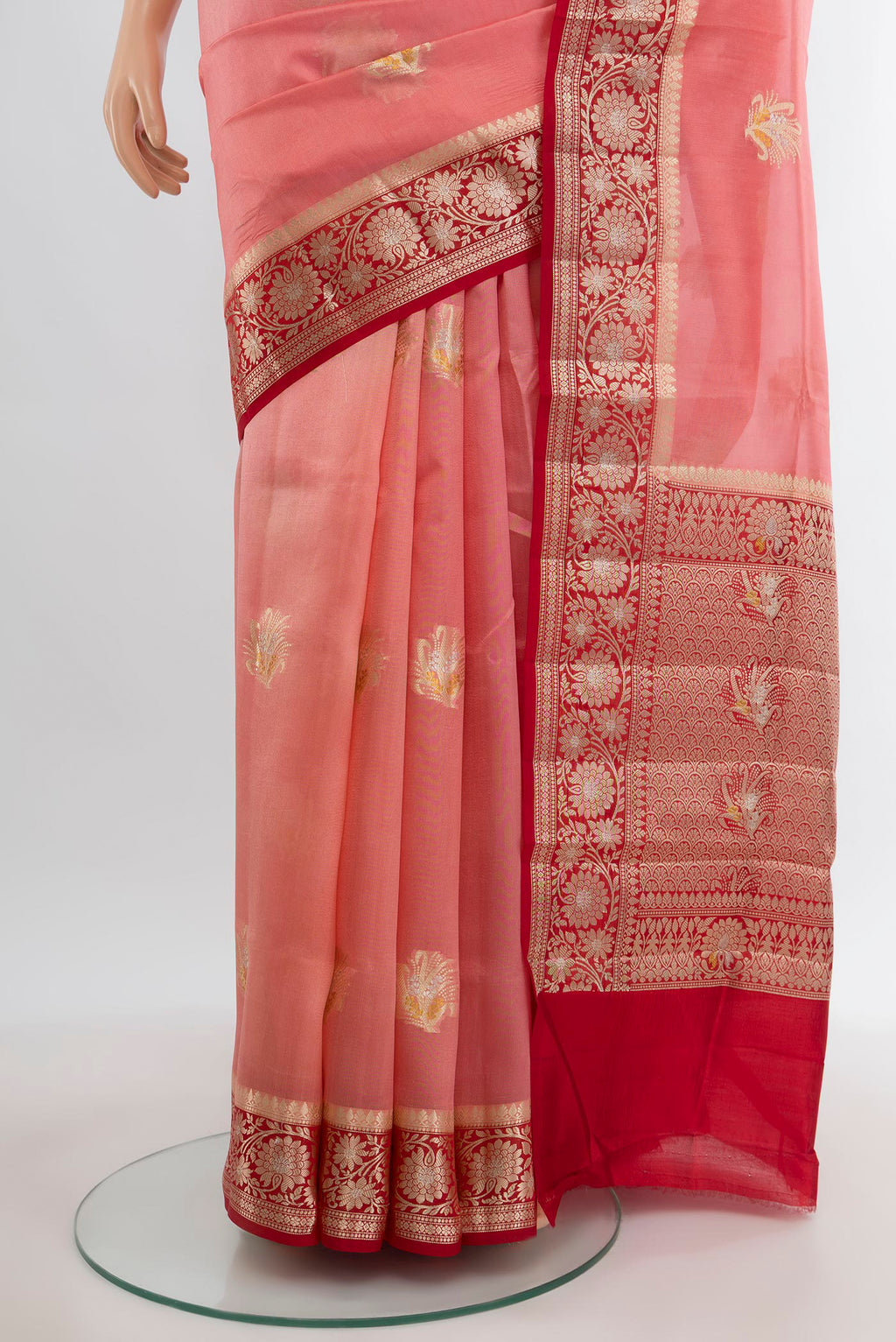 Pleats and pallu of Coral Banarasi Raw Silk Saree with Zari Butta on the body and Zari Border. 
