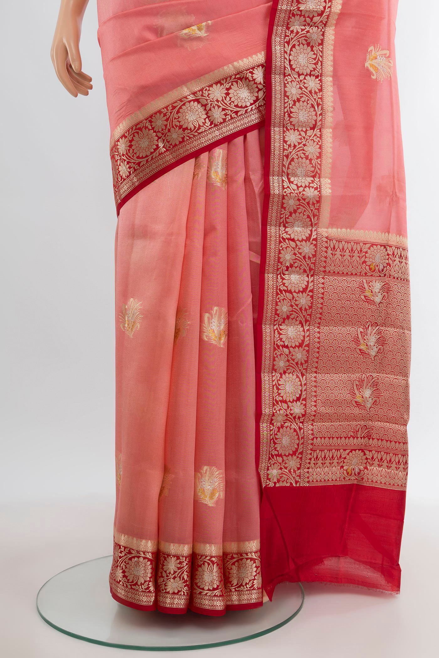 Pleats and pallu of Coral Banarasi Raw Silk Saree with Zari Butta on the body and Zari Border. 