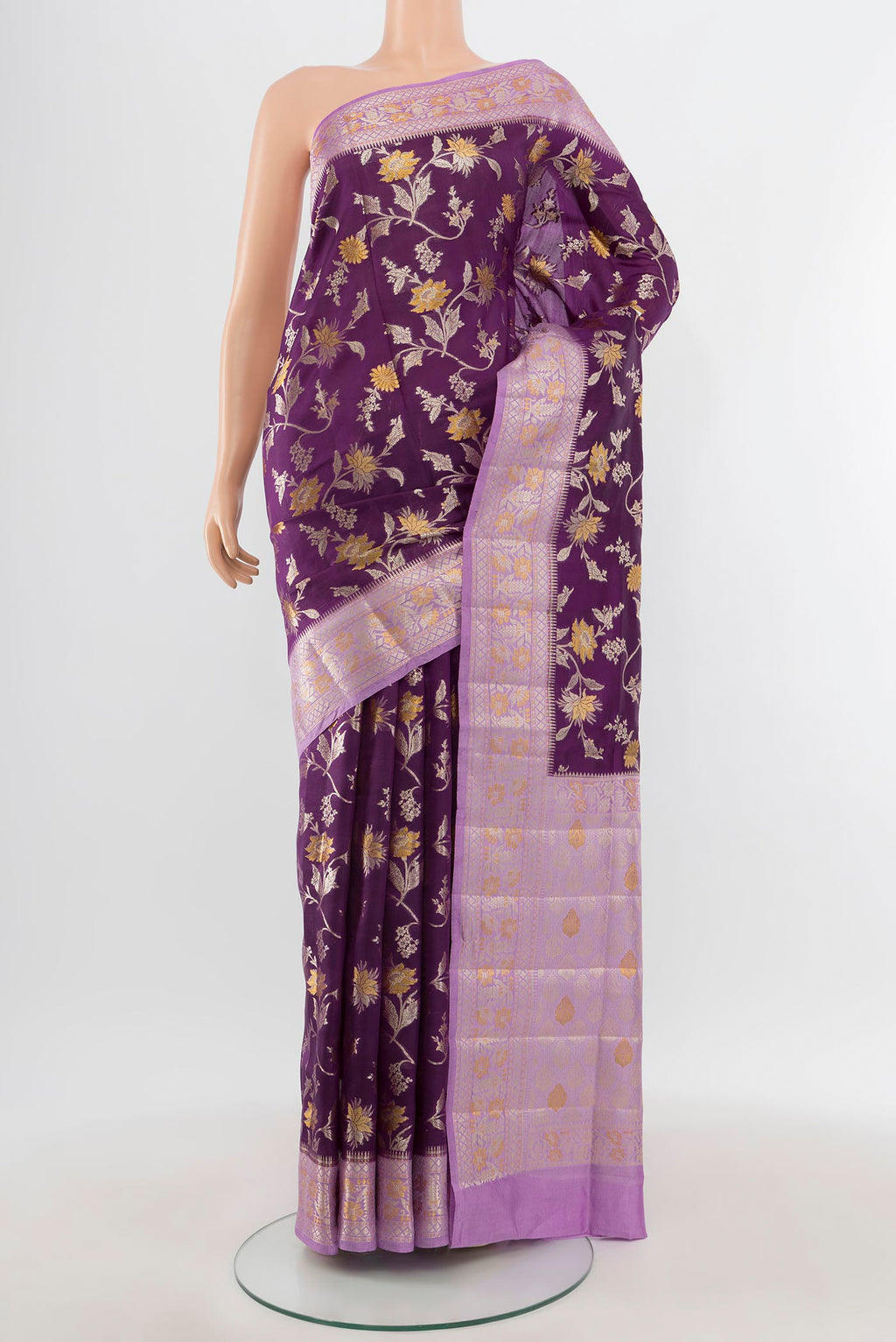 Violet Banarasi Raw Silk Saree with Zari Butta on the body and Zari Border.  displayed on a mannequin