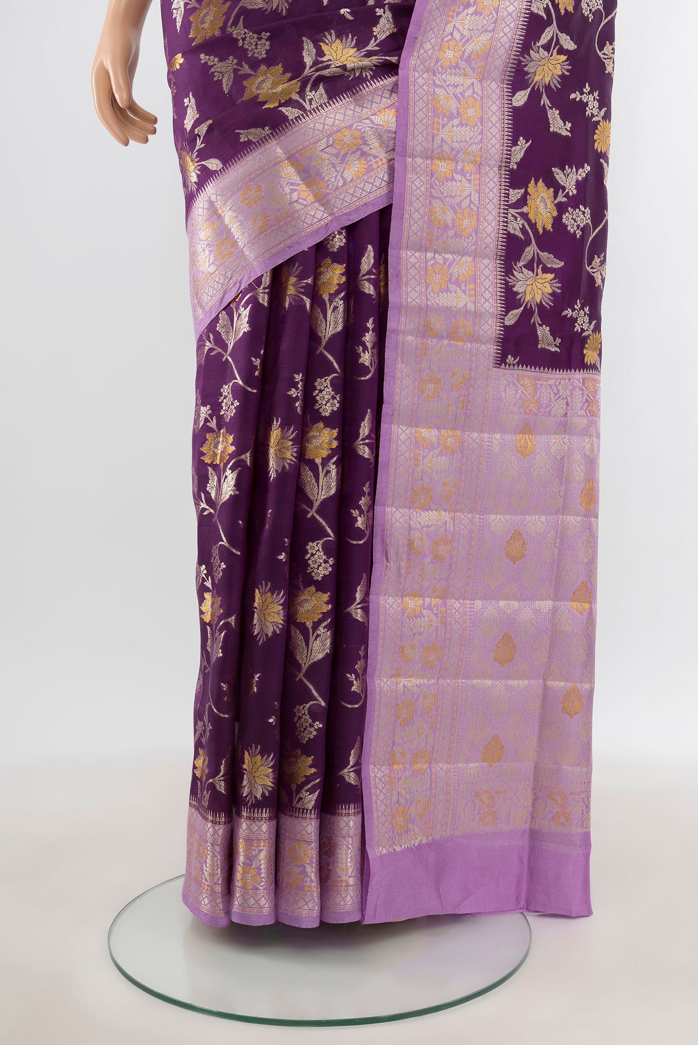 Pleats and pallu of Violet Banarasi Raw Silk Saree with Zari Butta on the body and Zari Border. 