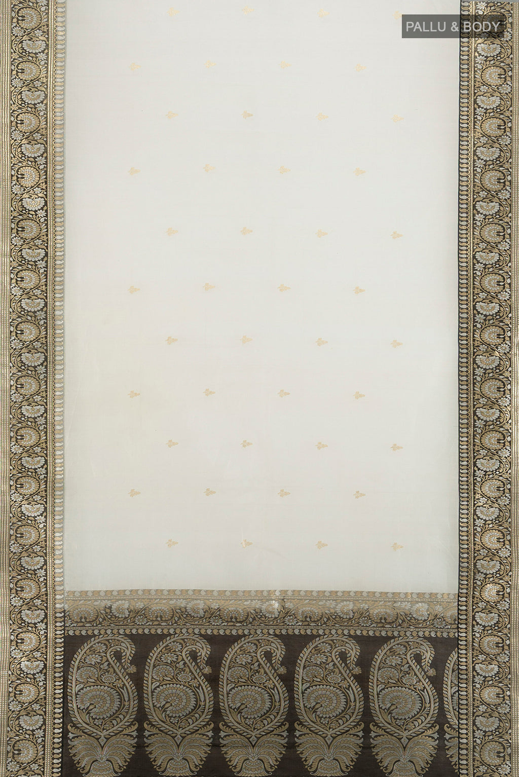 Flat view of White Banarasi Kora Silk Saree with Zari Butta on the body and Zari Border. 