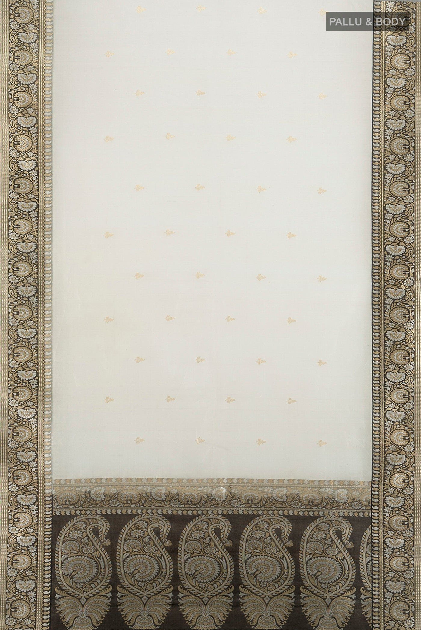 Flat view of White Banarasi Kora Silk Saree with Zari Butta on the body and Zari Border. 