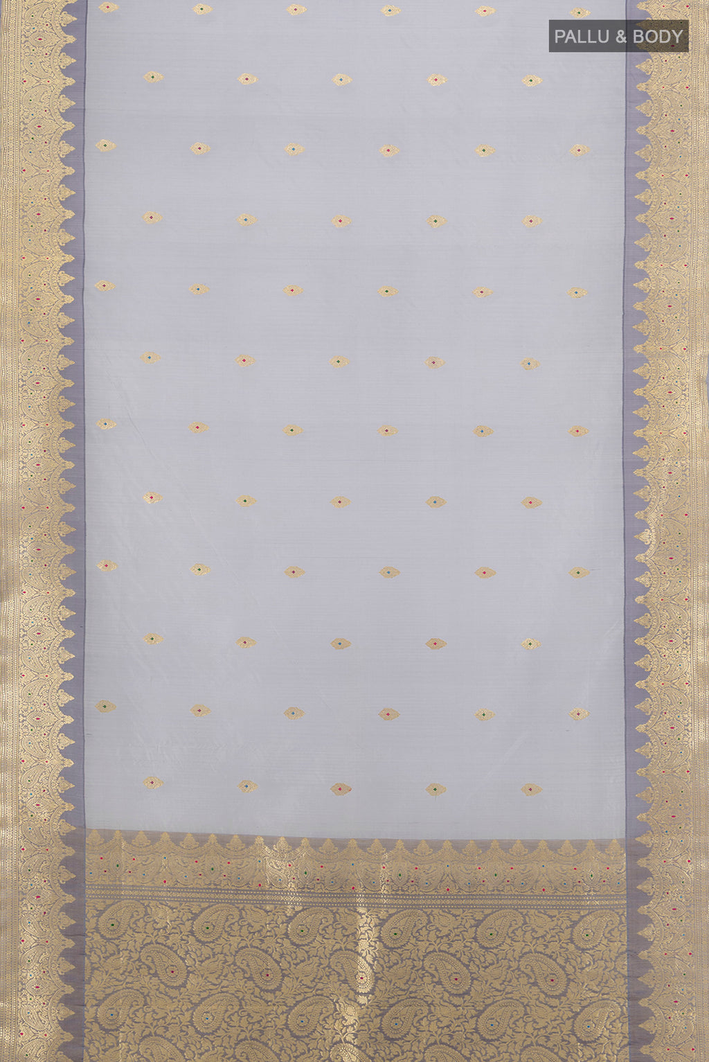 Flat view of Davys Grey Banarasi Kora Silk Saree with Zari Butta on the body and Zari Border. 