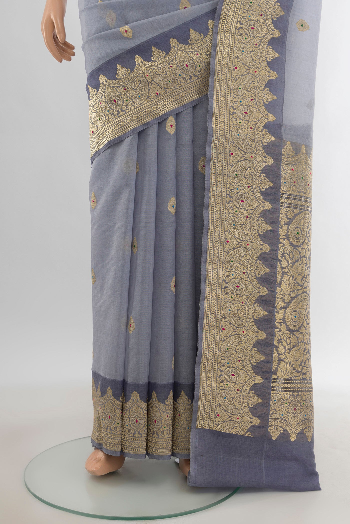 Pleats and pallu of Davys Grey Banarasi Kora Silk Saree with Zari Butta on the body and Zari Border. 