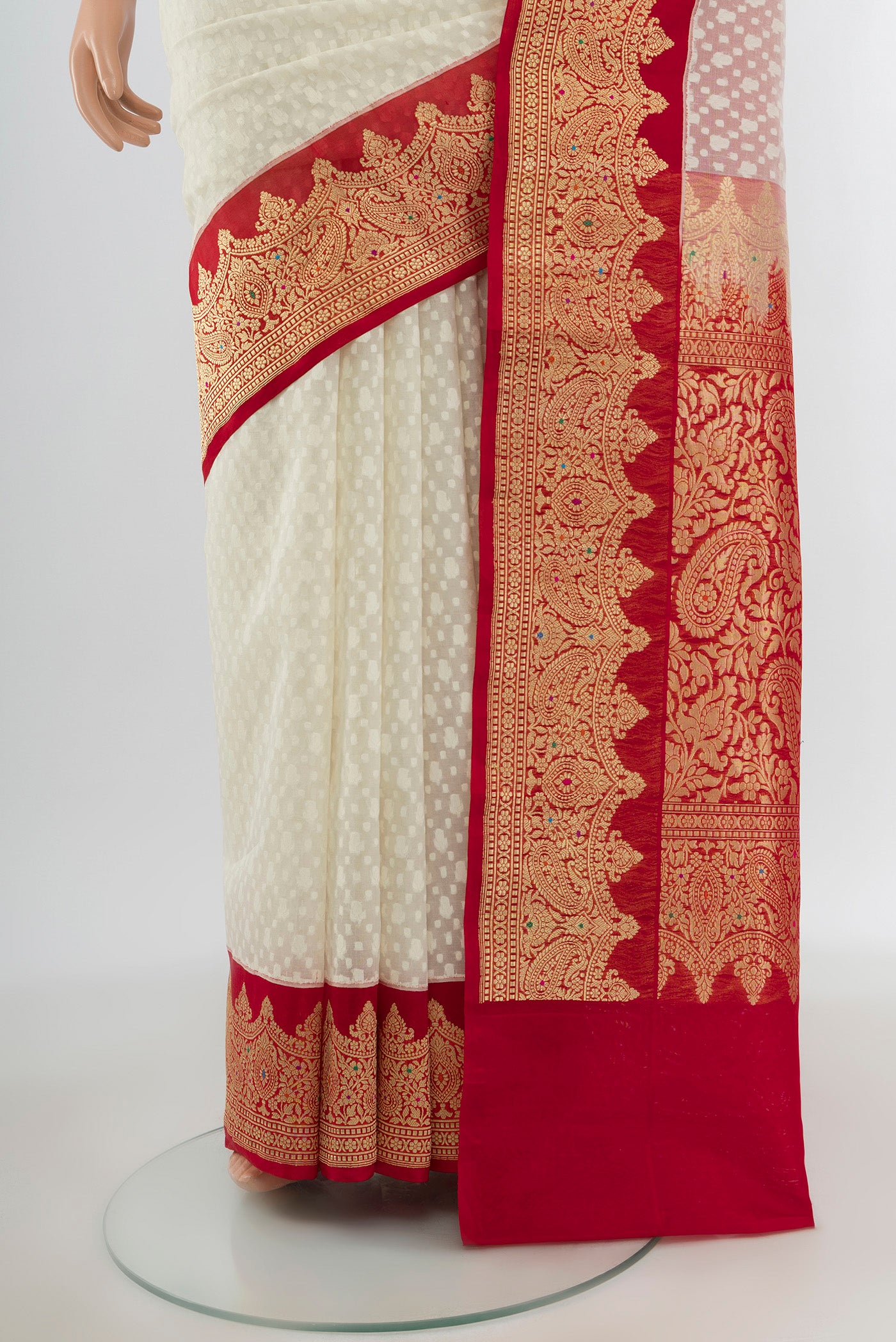 Pleats and pallu of Off White Banarasi Kora Silk Saree with Jacquard design on the body and Zari Border. 