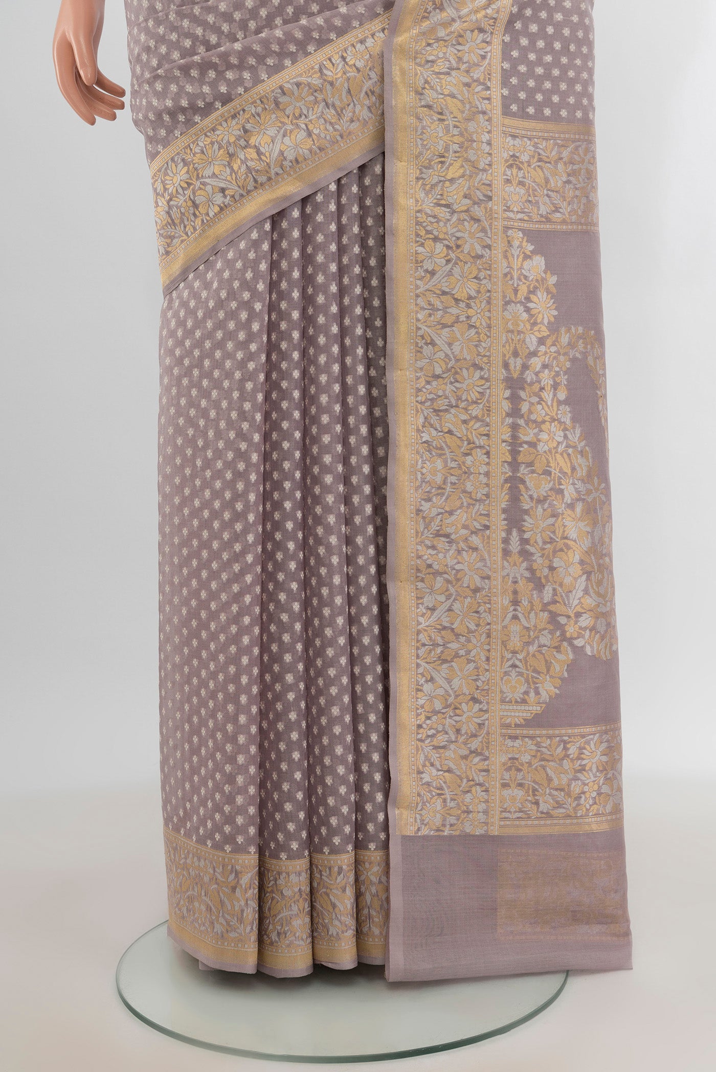 Pleats and pallu of Lilac Banarasi Kora Silk Saree with Zari Butta on the body and Zari Border. 