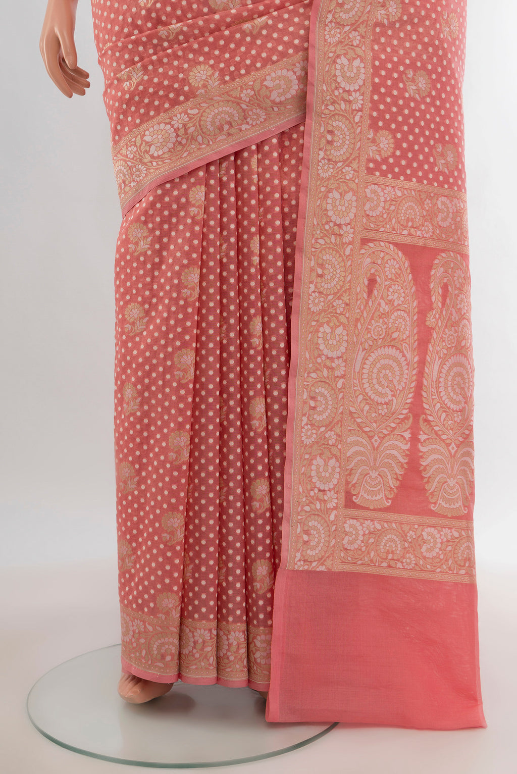 Pleats and pallu of Rose pink Banarasi Kora Silk Saree with Zari Butta on the body and Zari Border. 