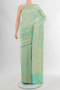 Light Blue Banarasi Silk Saree with Zari Brocade on the body and Zari Border.  displayed on a mannequin