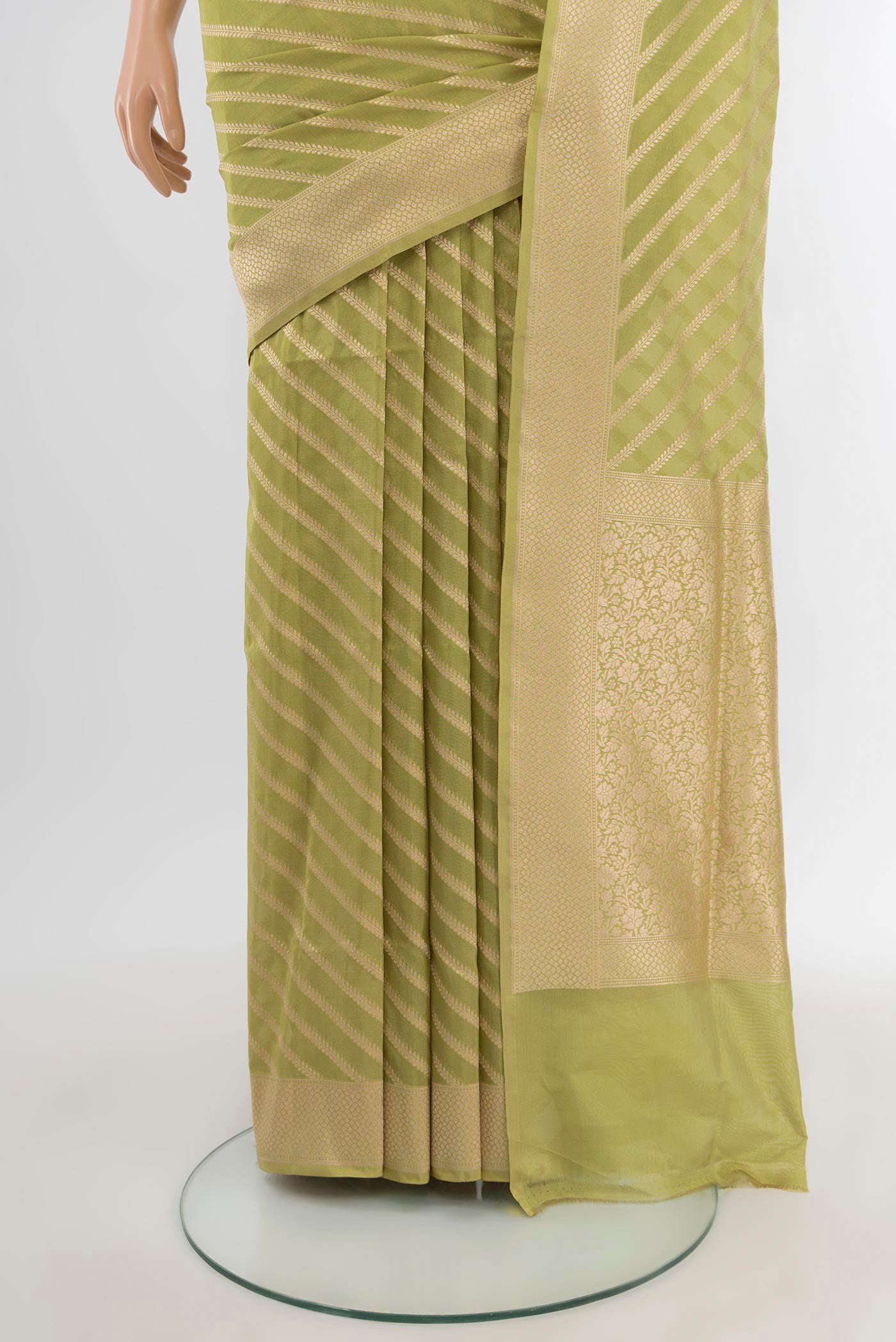 Pleats and pallu of Pista Green Banarasi Silk Saree with Stripes on the body and Zari Border. 