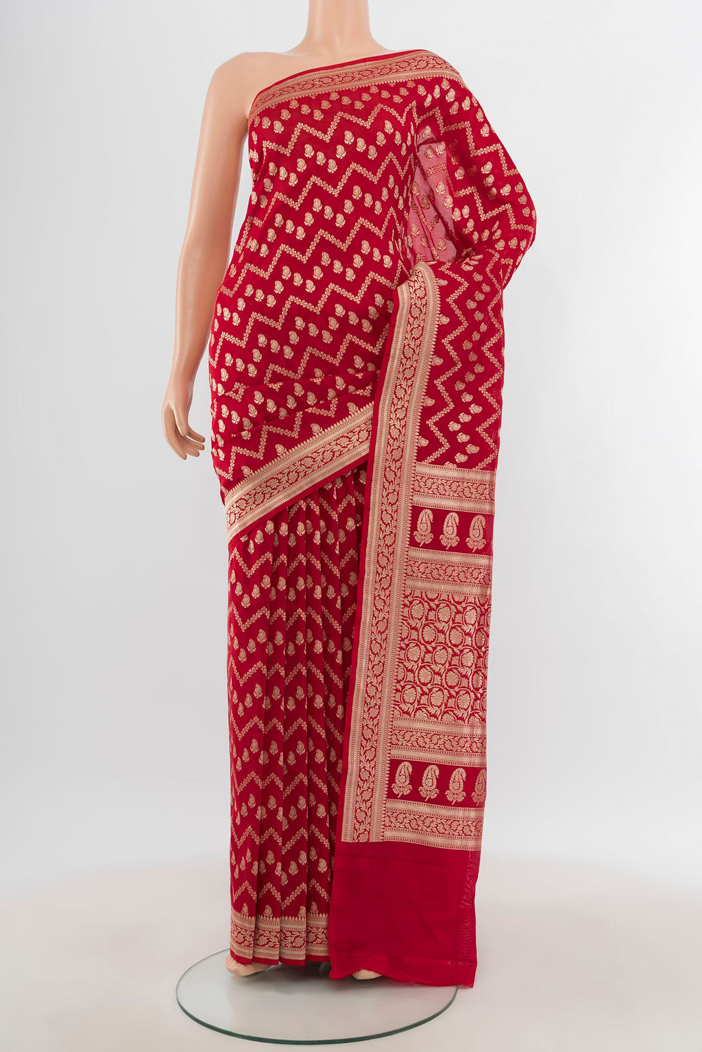 Red Banarasi Silk Saree with Zari Butta on the body and Zari Border.  displayed on a mannequin