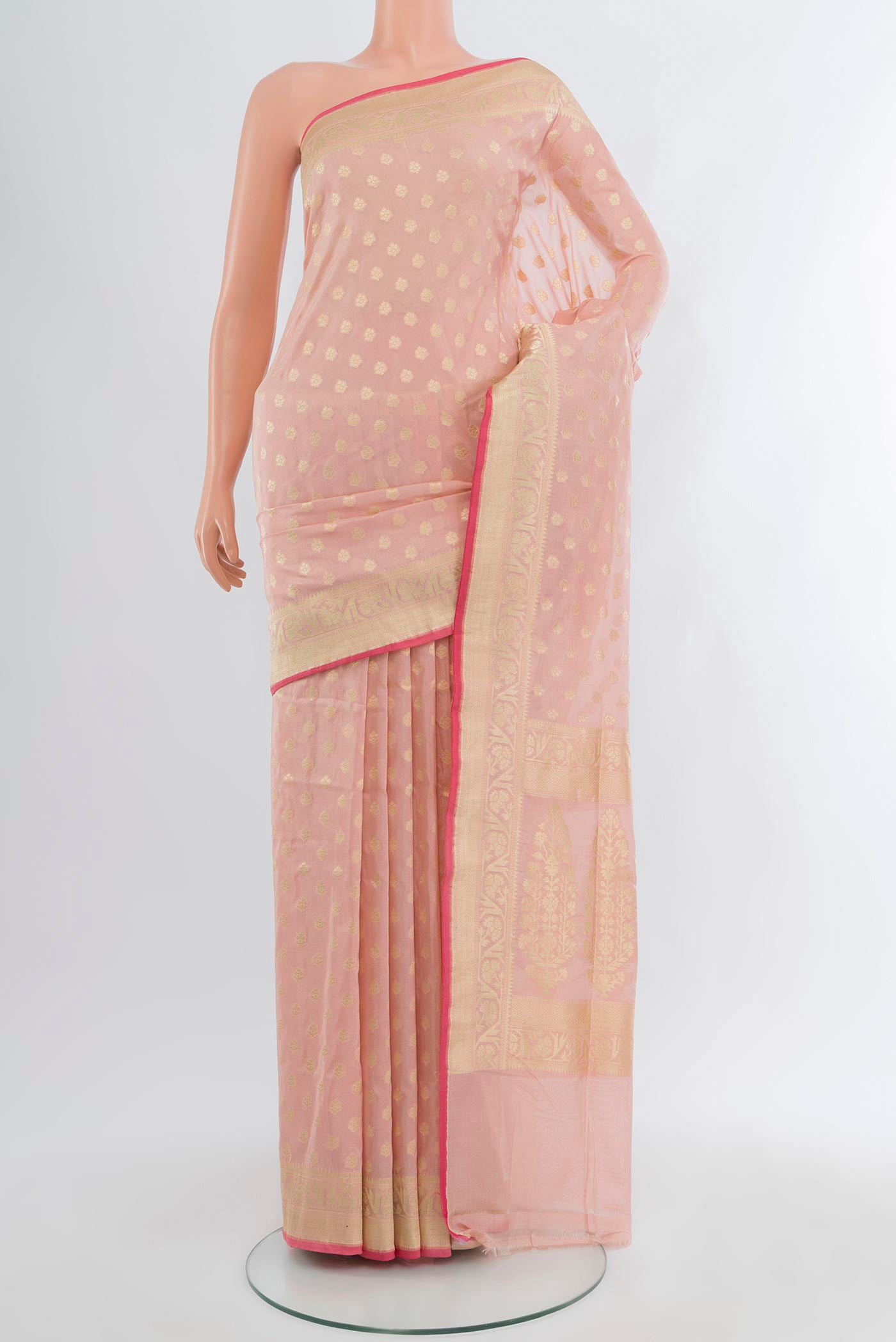 Rose pink Banarasi Silk Saree with Zari Butta on the body and Zari Border.  displayed on a mannequin
