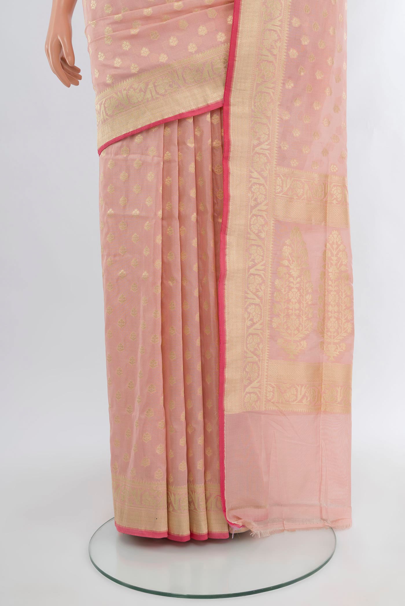 Pleats and pallu of Rose pink Banarasi Silk Saree with Zari Butta on the body and Zari Border. 