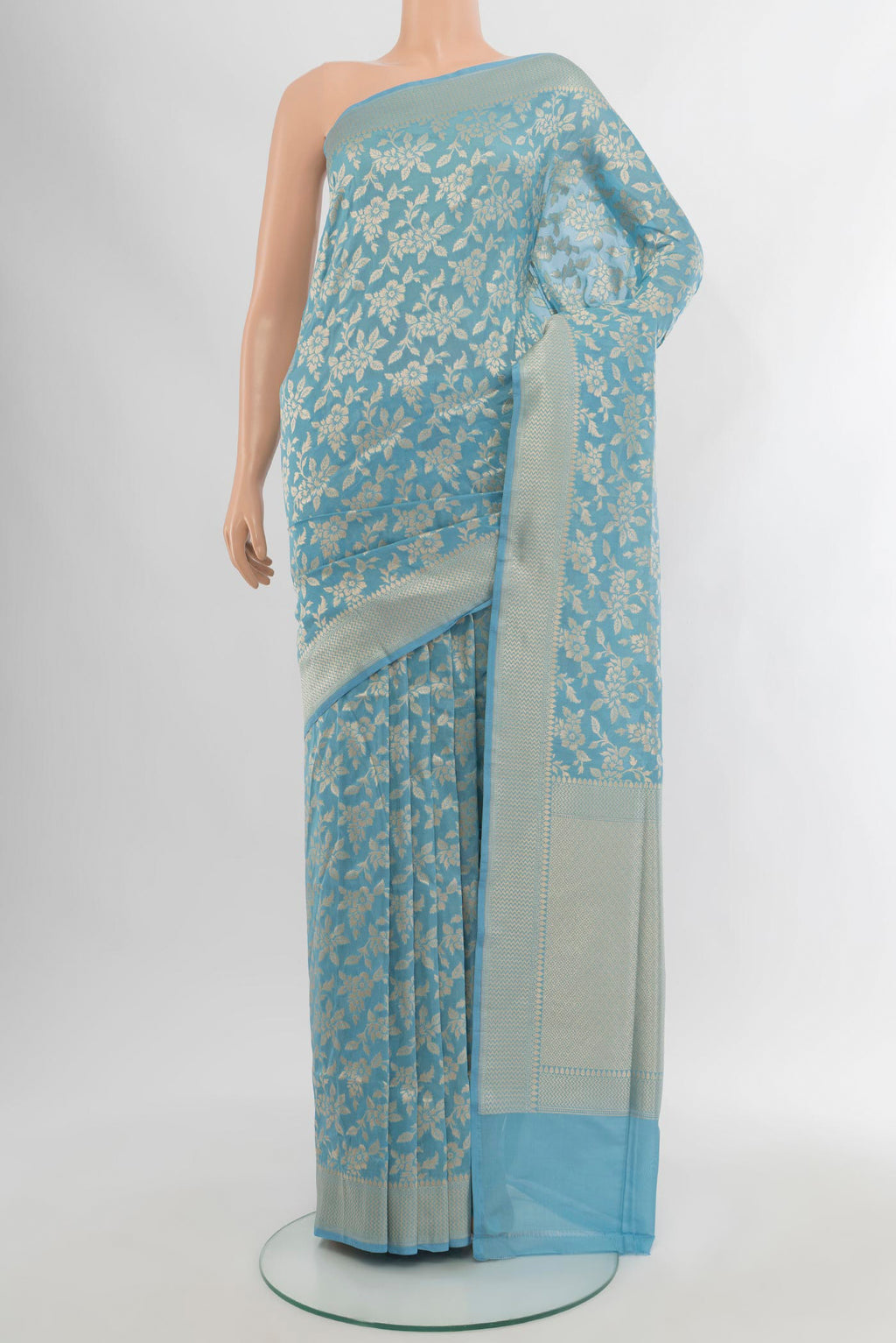Maya Blue Banarasi Silk Saree with Zari Brocade on the body and Zari Border.  displayed on a mannequin