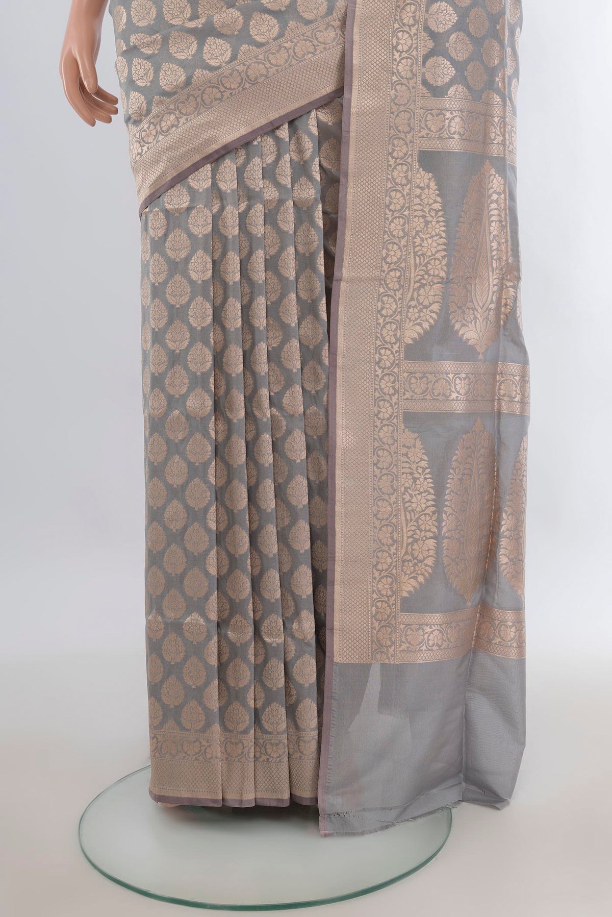 Pleats and pallu of Pure Silk Grey Banarasi Saree with Zari Butta on the body and Zari Border. 