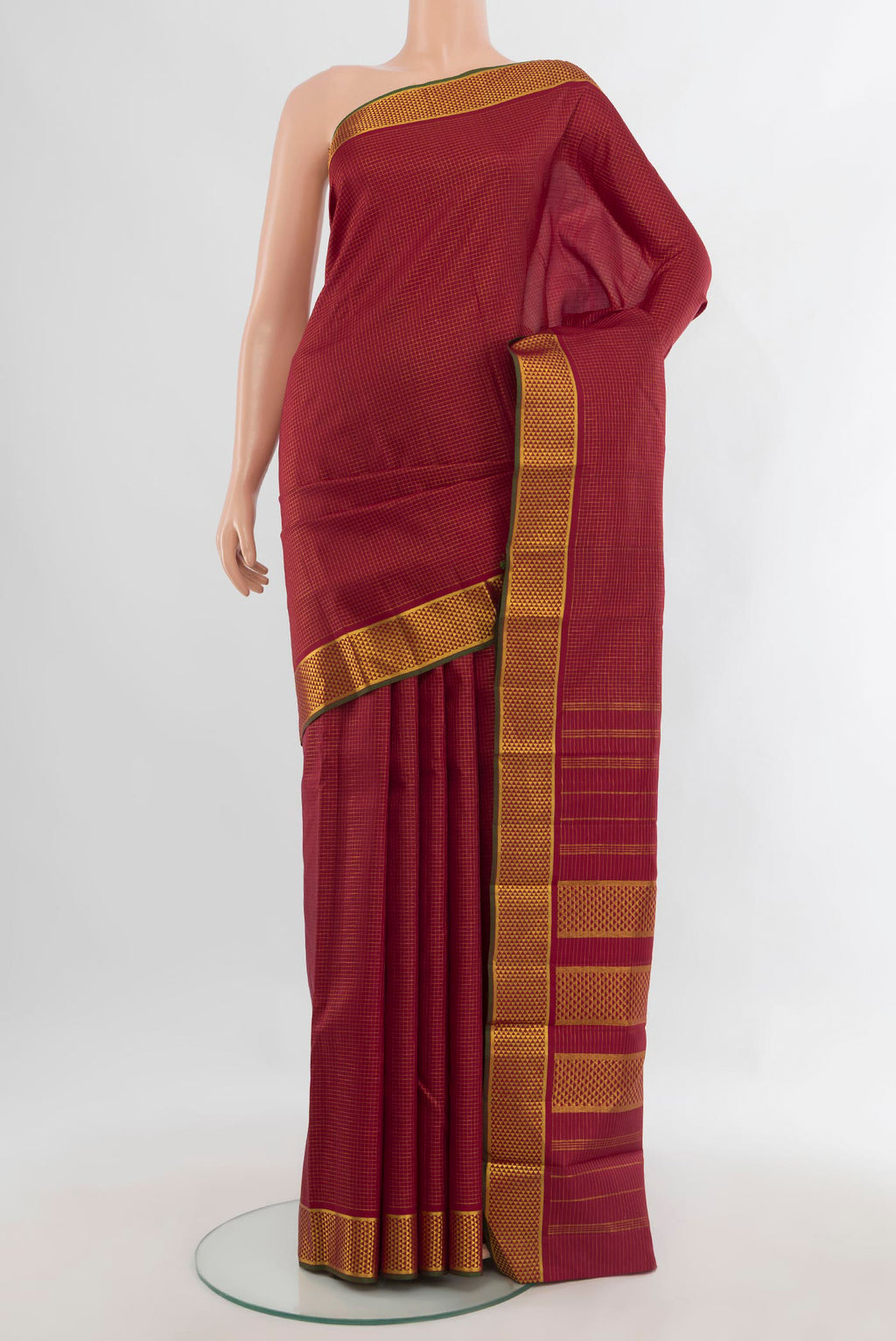 Pure Silk Maroon Kanchipuram Saree with Checked design on the body and Zari Border.  displayed on a mannequin