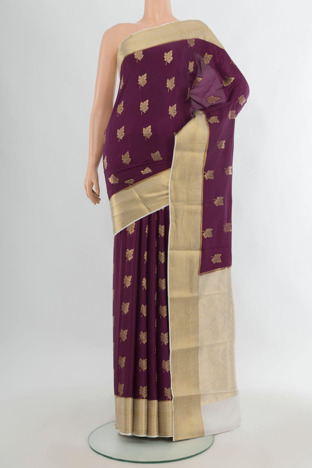 Purple Mysore Crepe Saree with Zari Butta on the body and Zari Border.  displayed on a mannequin