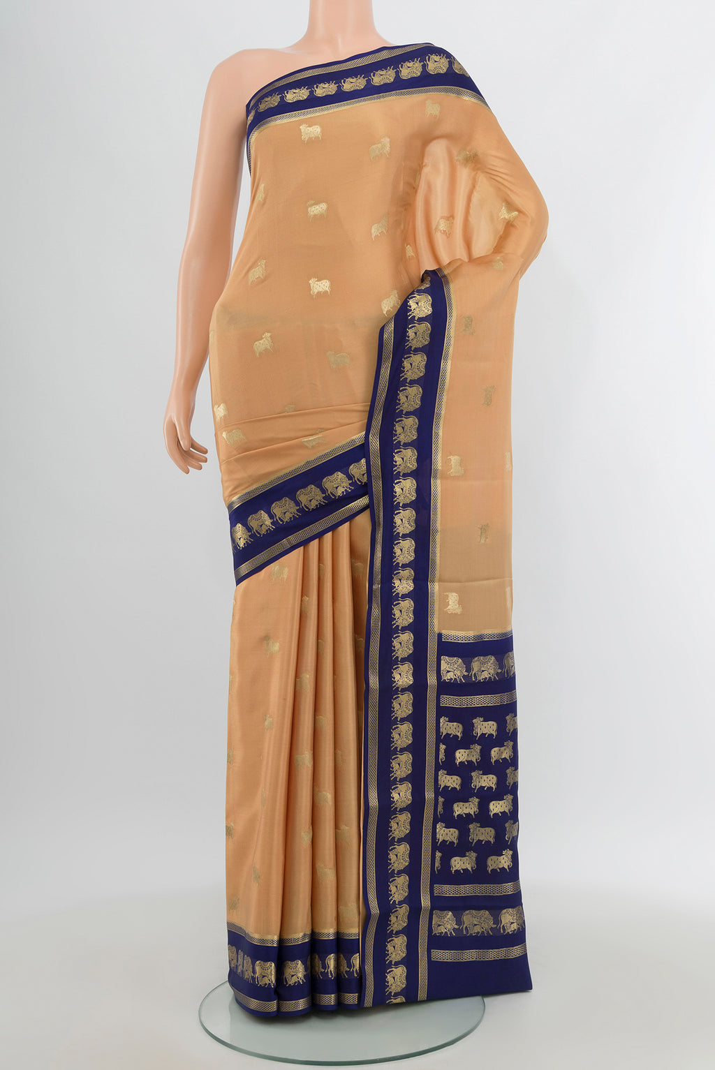 Sandal Mysore Crepe Saree with Zari Butta on the body and Zari Border.  displayed on a mannequin