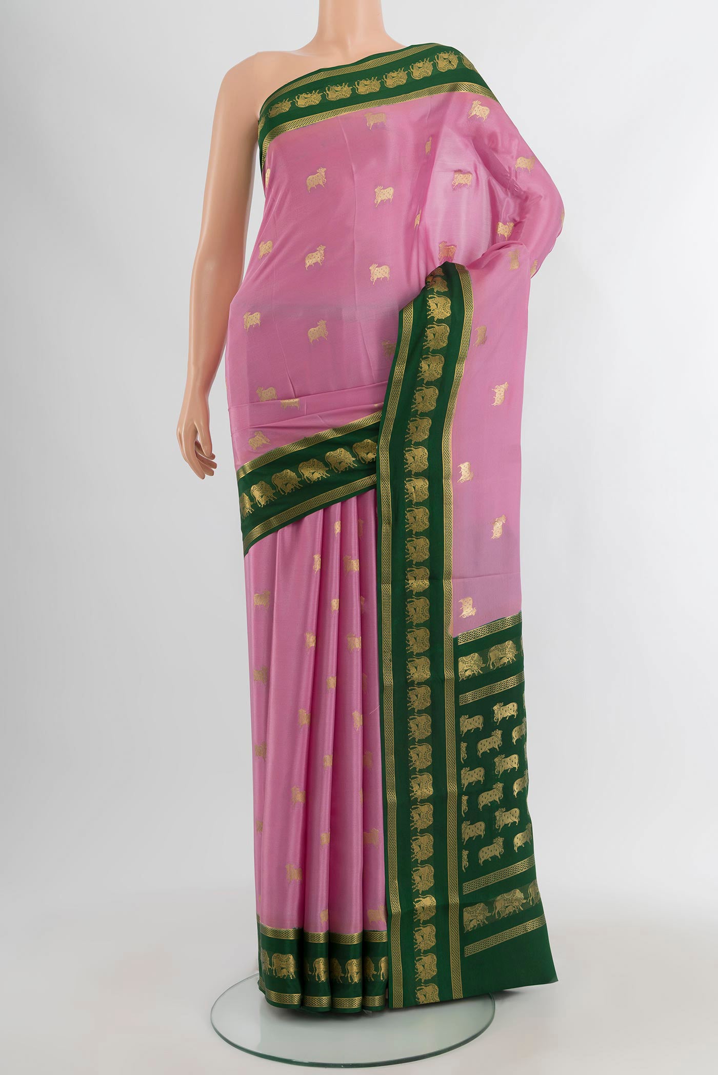 Rose pink Mysore Crepe Saree with Zari Butta on the body and Zari Border.  displayed on a mannequin