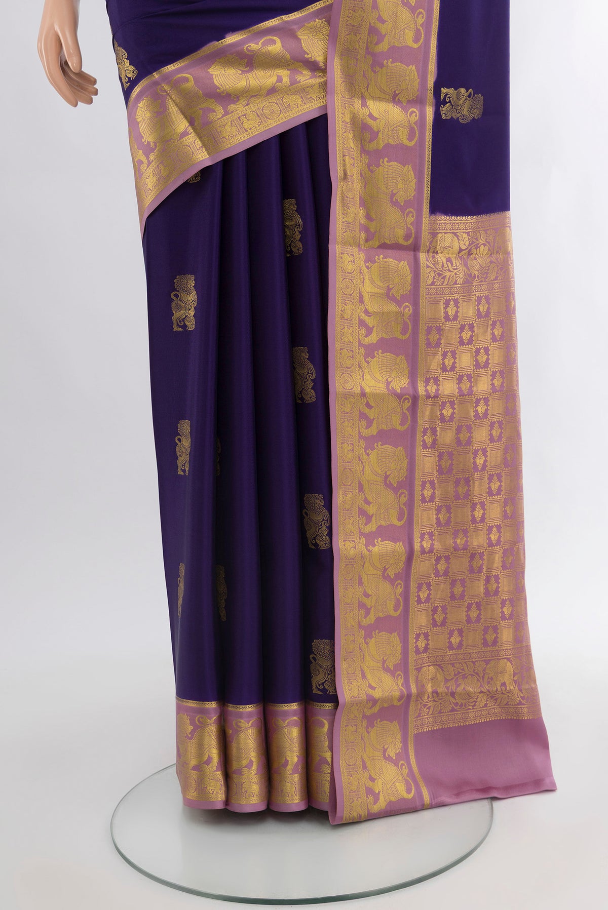 Pleats and pallu of Navy Blue Mysore Crepe Saree with Zari Butta on the body and Zari Border. 
