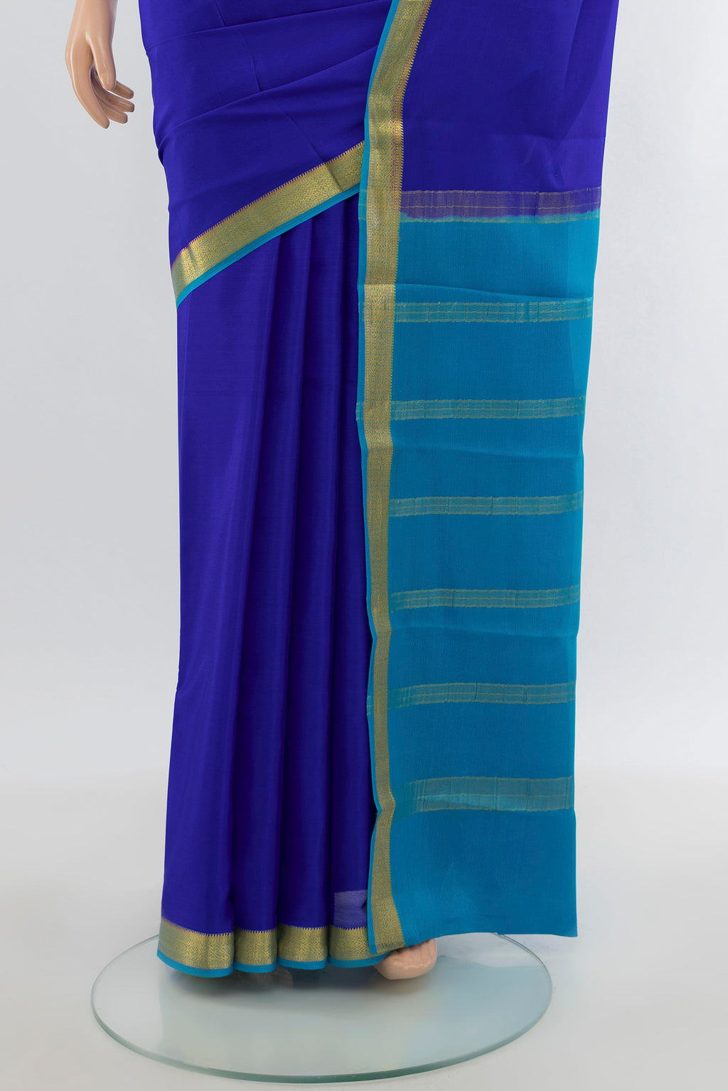 Pleats and pallu of Royal Blue Mysore Crepe Saree with Plain Body and Zari Border. 