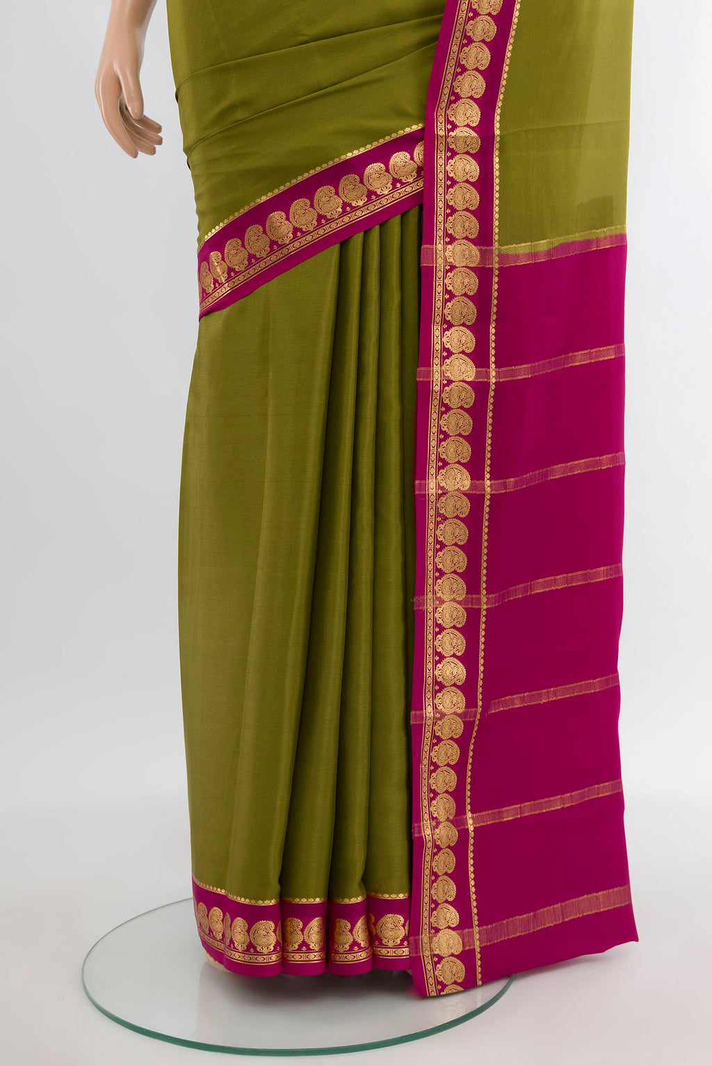 Pleats and pallu of Mehandi Green Mysore Crepe Saree with Plain Body and Zari Border. 