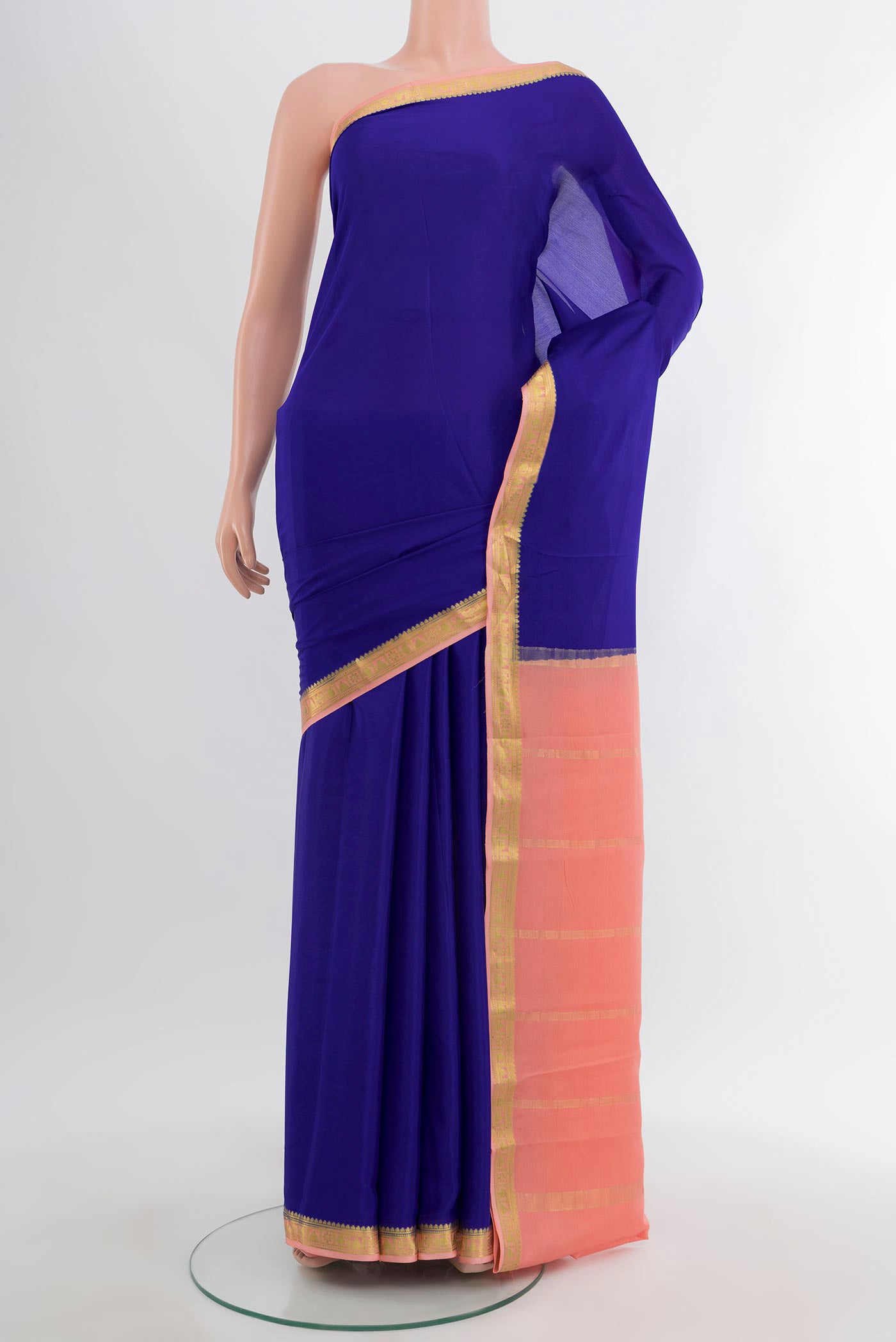 Dark Blue Mysore Crepe Saree with Plain Body and Zari Border.  displayed on a mannequin