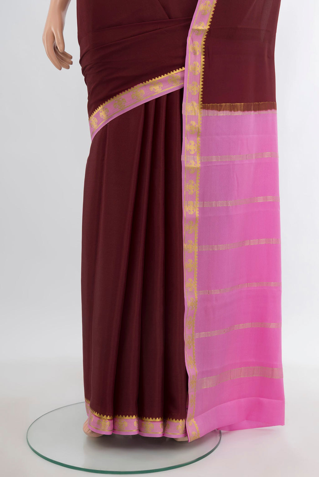 Pleats and pallu of Coffee Brown Mysore Crepe Saree with Plain Body and Zari Border. 