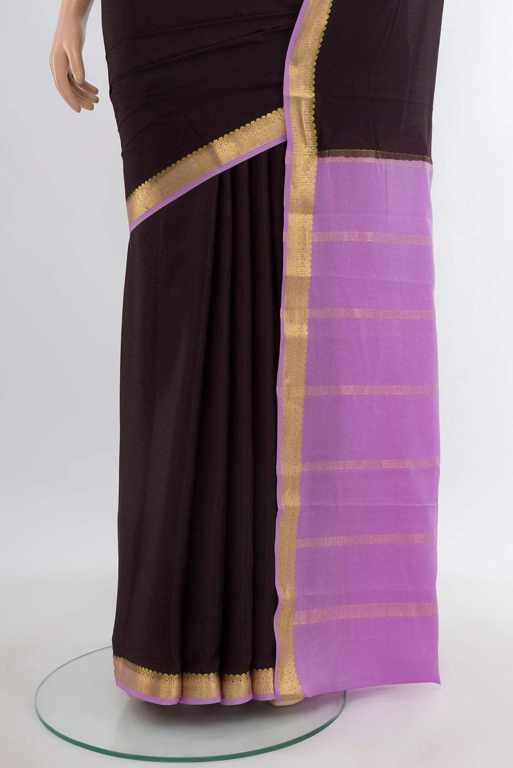 Pleats and pallu of Black Mysore Crepe Saree with Plain Body and Zari Border. 