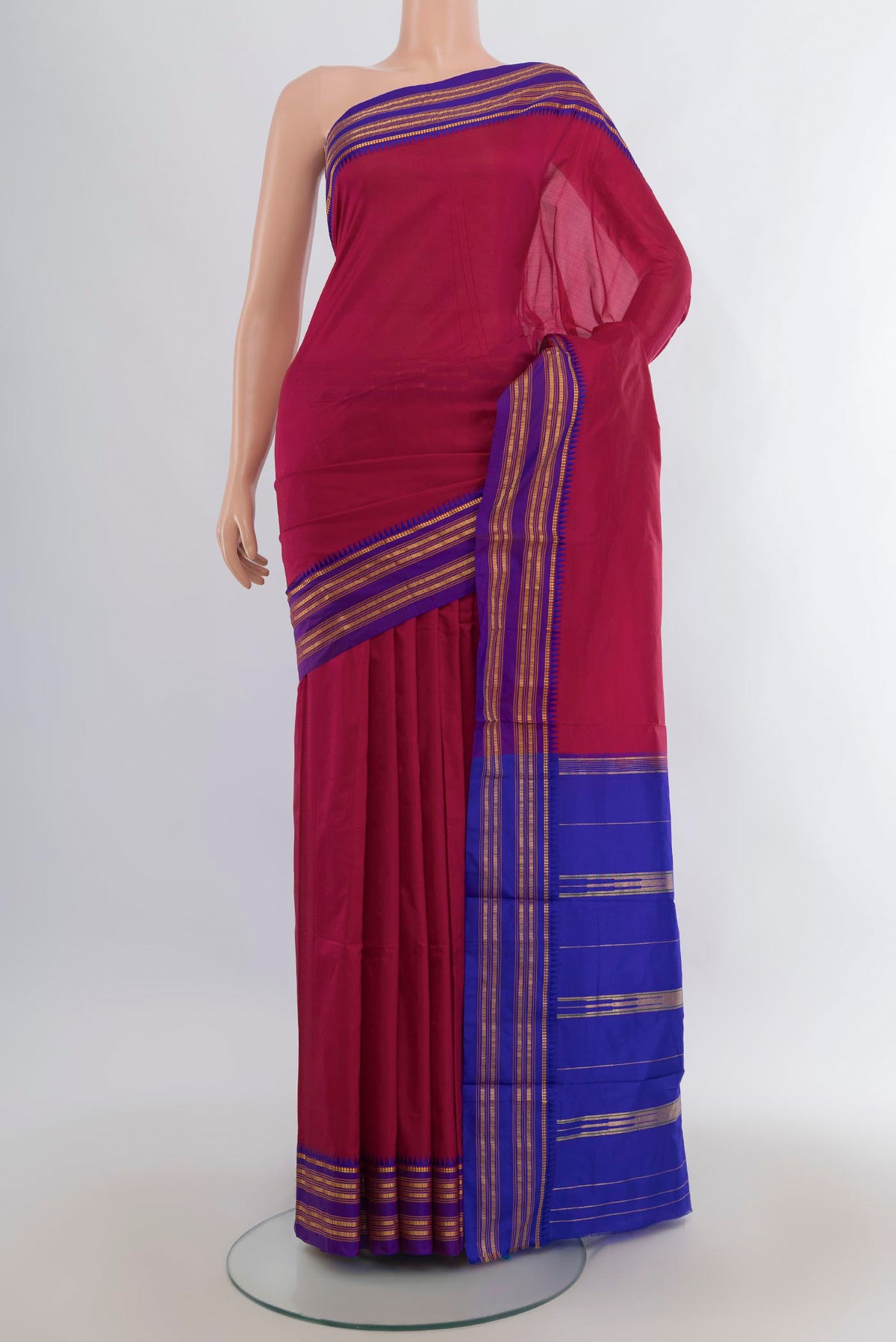 Pure Silk Dark Pink Narayanpet Saree with Plain Body and Zari Border.  displayed on a mannequin