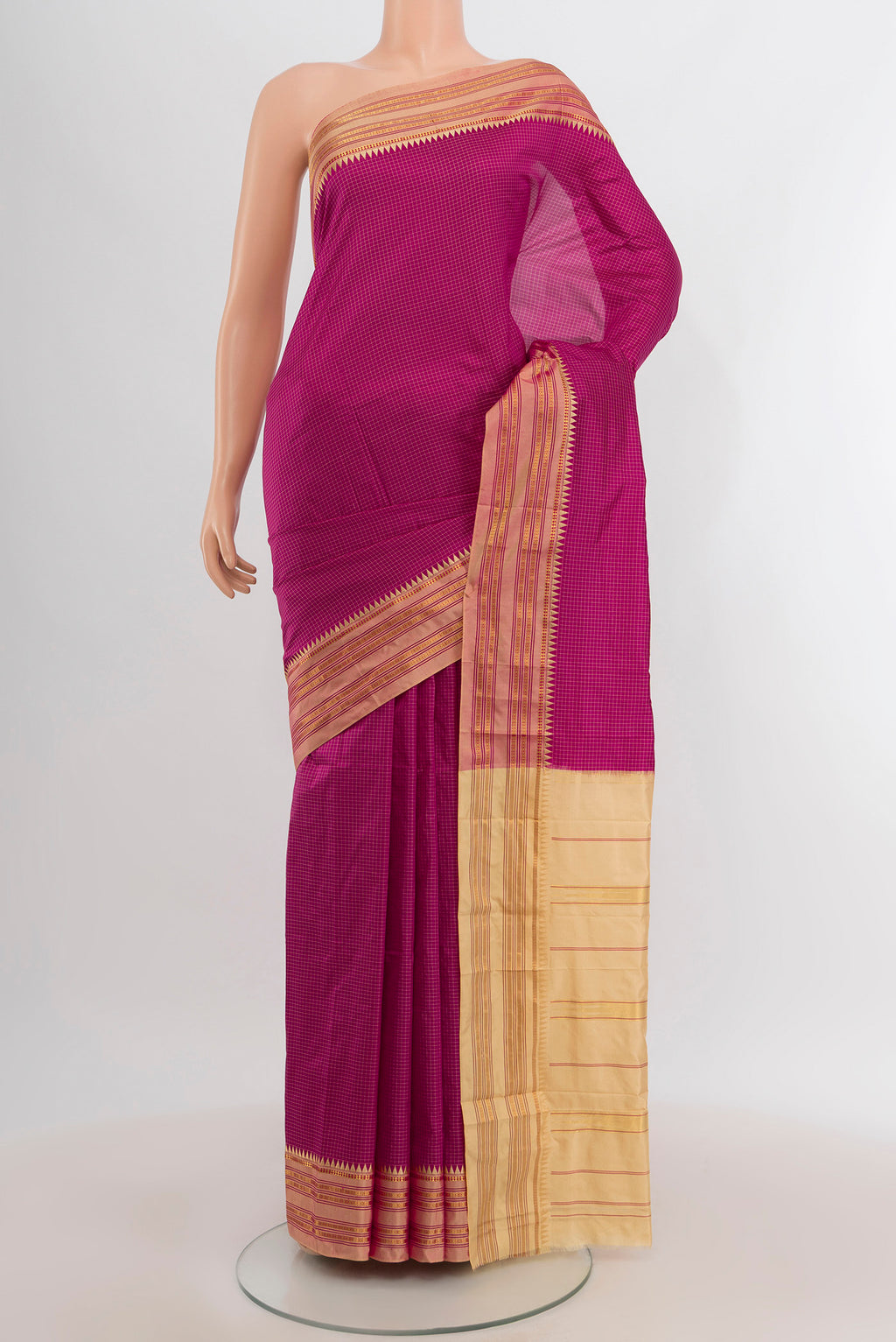 Magenta Narayanpet Silk Saree with Checked design on the body and Zari Border.  displayed on a mannequin