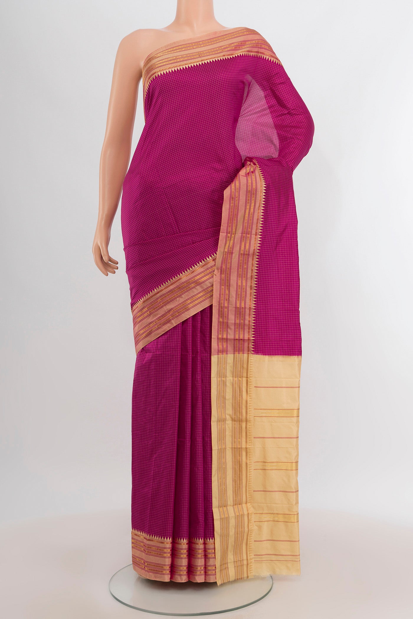 Magenta Narayanpet Silk Saree with Checked design on the body and Zari Border.  displayed on a mannequin