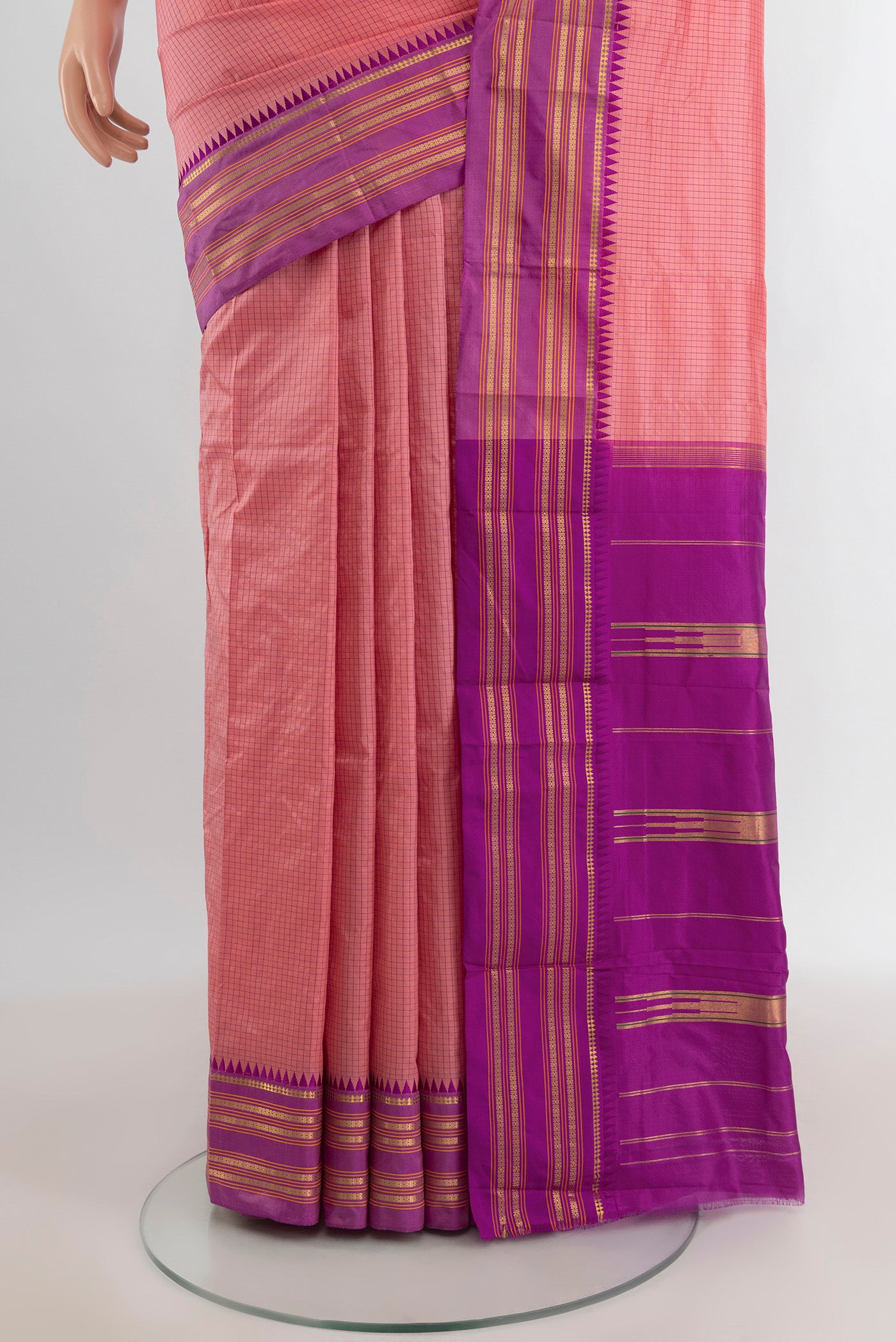 Pleats and pallu of Rose pink Narayanpet Silk Saree with Checked design on the body and Zari Border. 