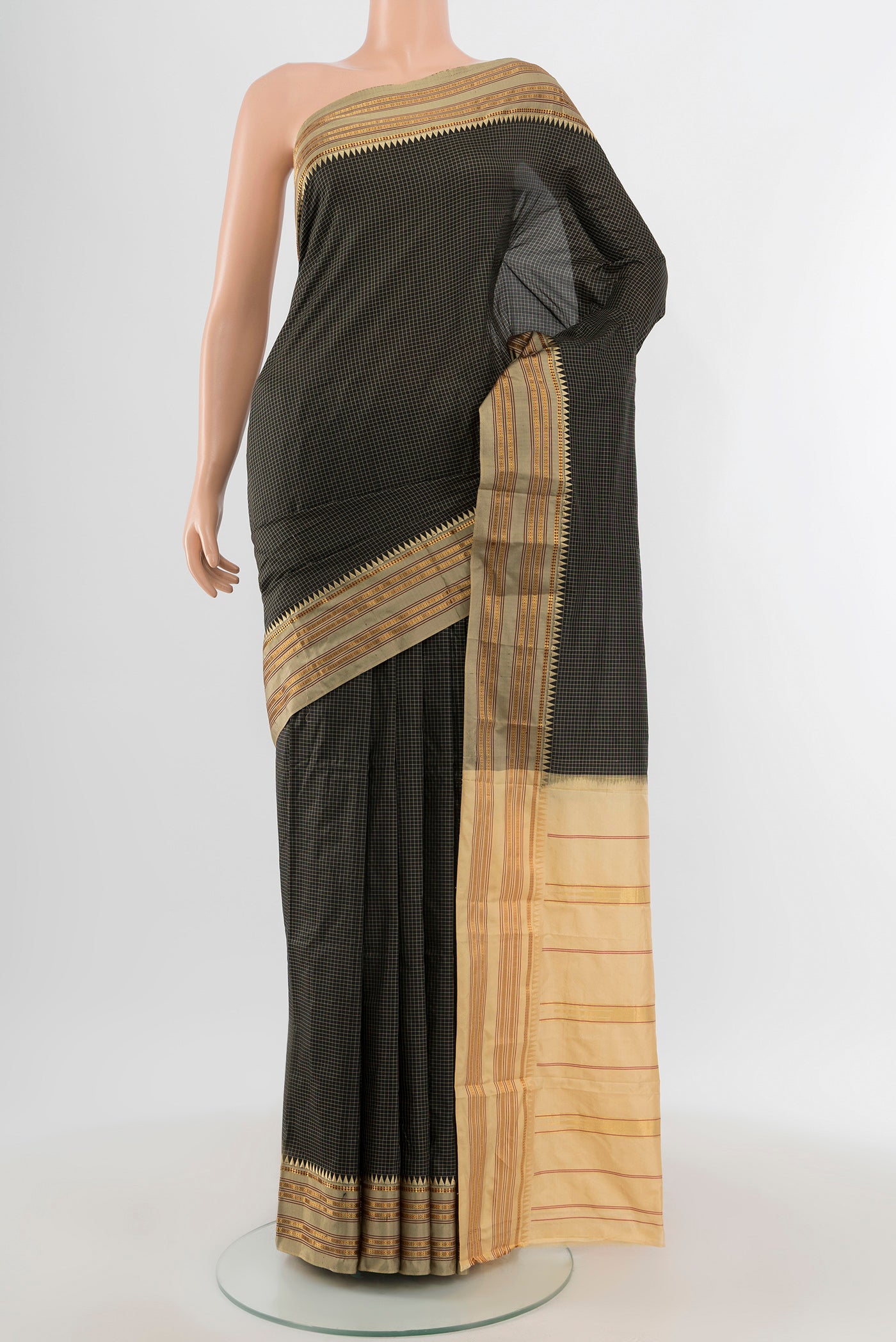 Black Narayanpet Silk Saree with Checked design on the body and Zari Border.  displayed on a mannequin