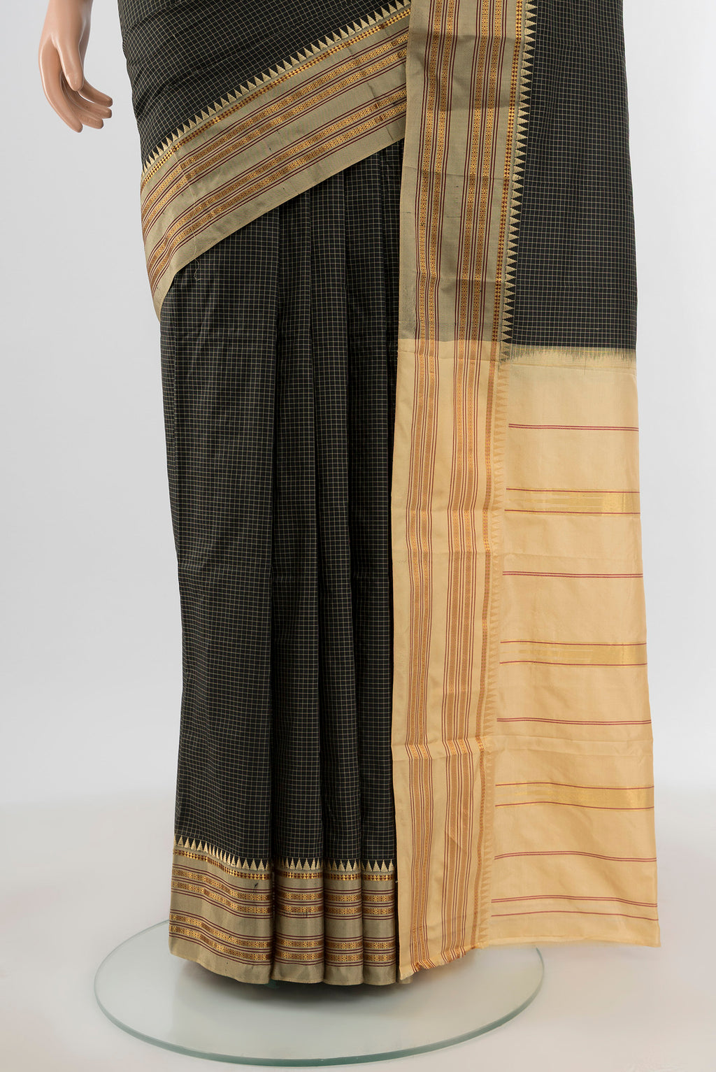 Pleats and pallu of Black Narayanpet Silk Saree with Checked design on the body and Zari Border. 