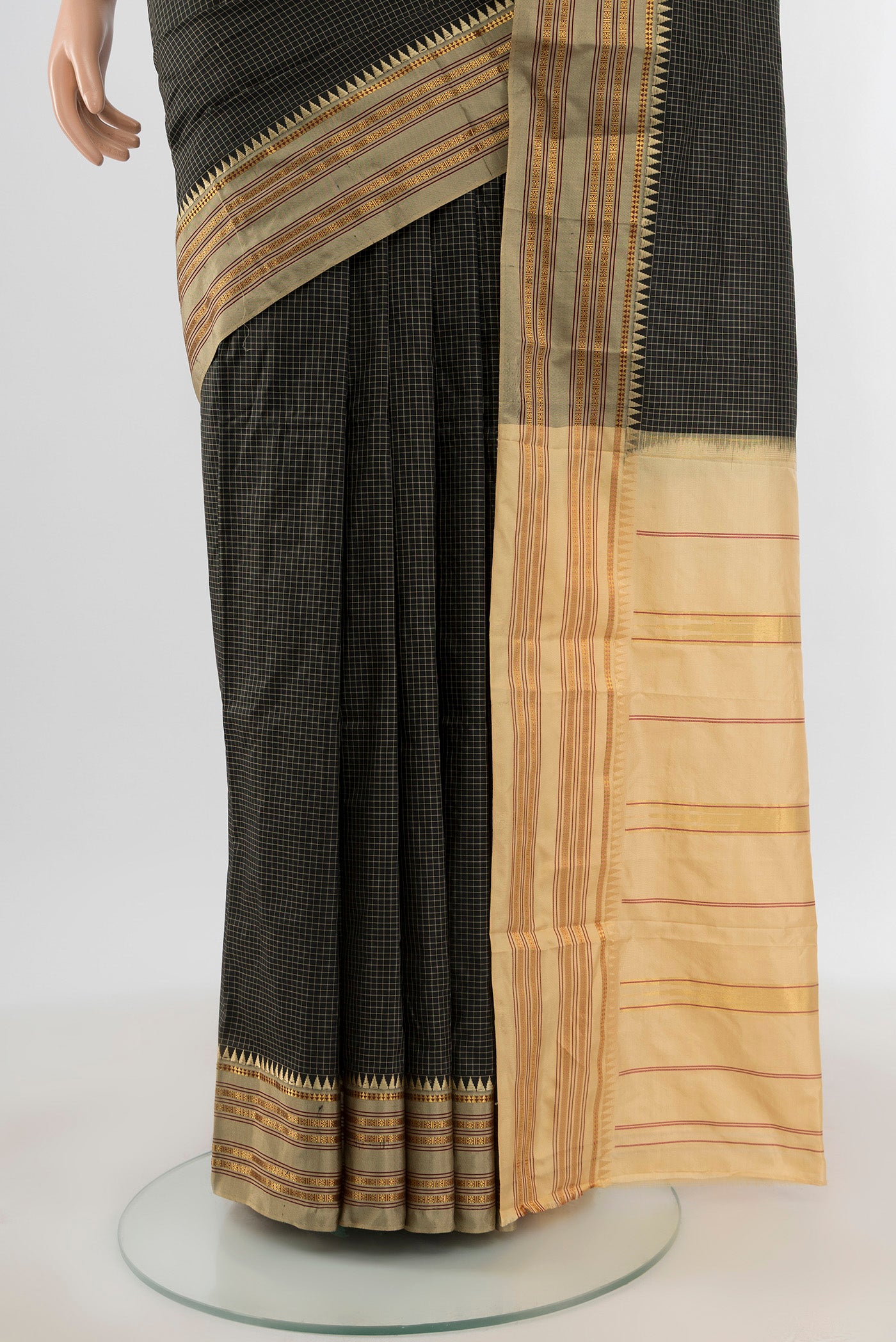 Pleats and pallu of Black Narayanpet Silk Saree with Checked design on the body and Zari Border. 