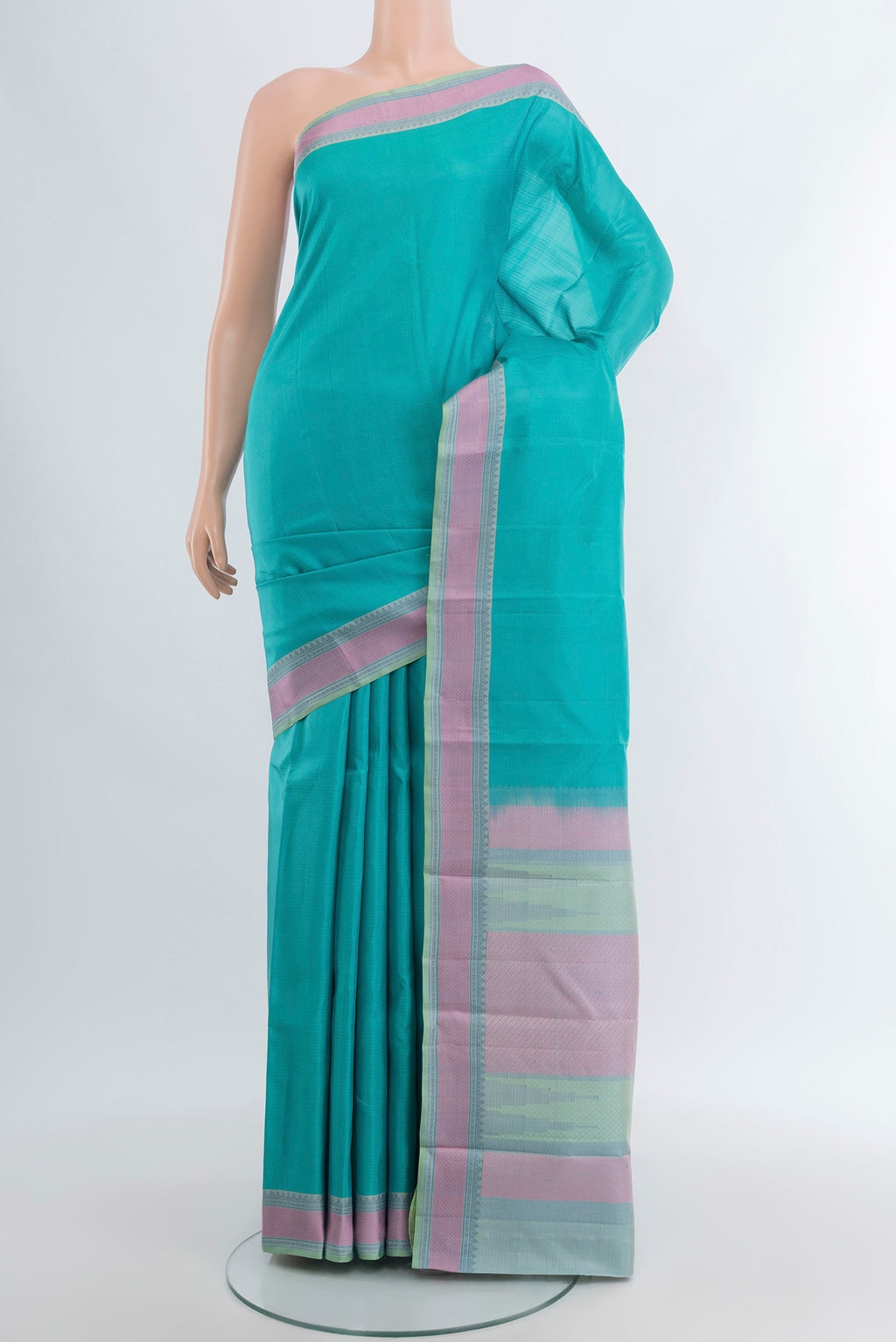 Sky Blue Kanchipuram Silk Saree with Plain Body and Thread Border.  displayed on a mannequin