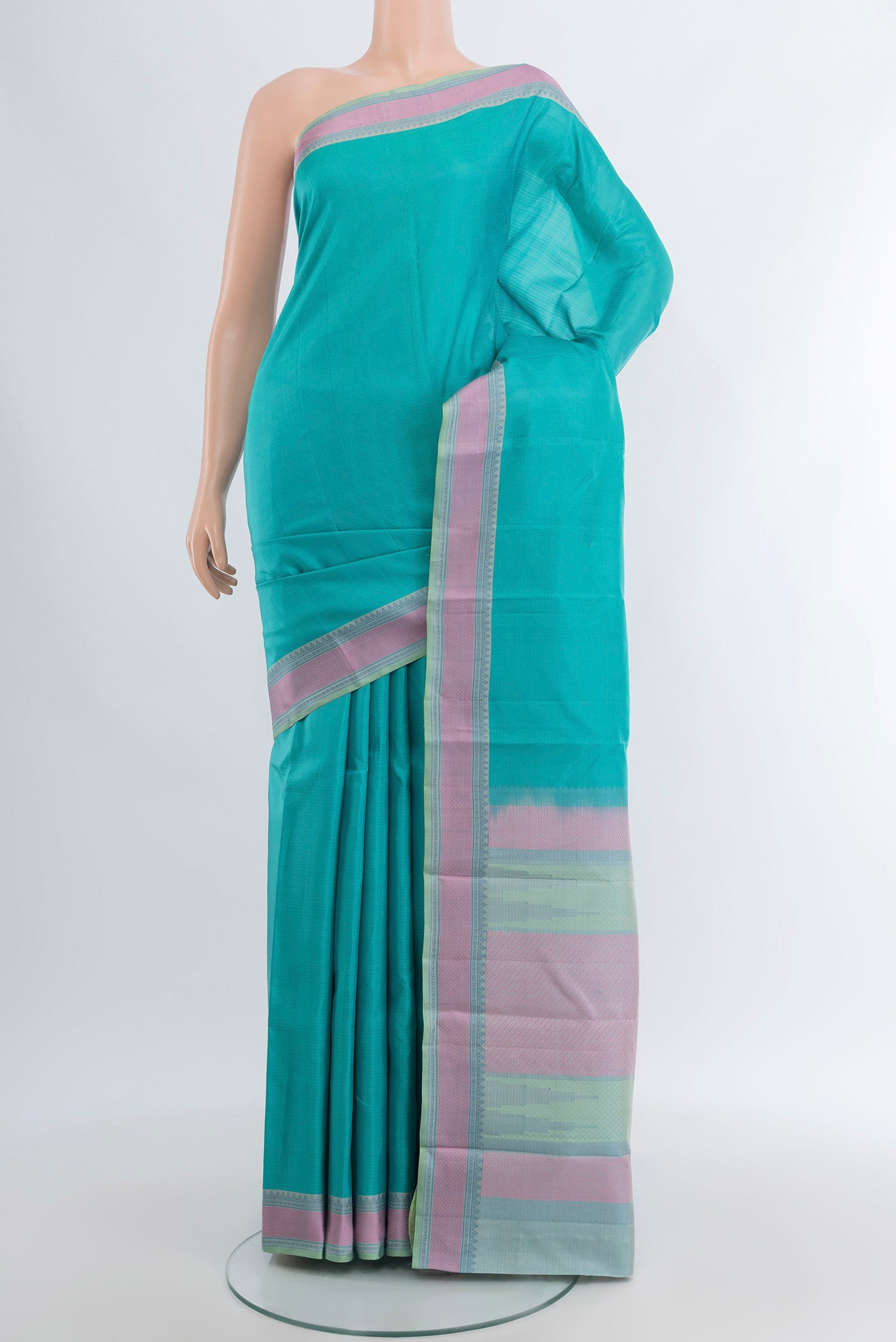 Sky Blue Kanchipuram Silk Saree with Plain Body and Thread Border.  displayed on a mannequin