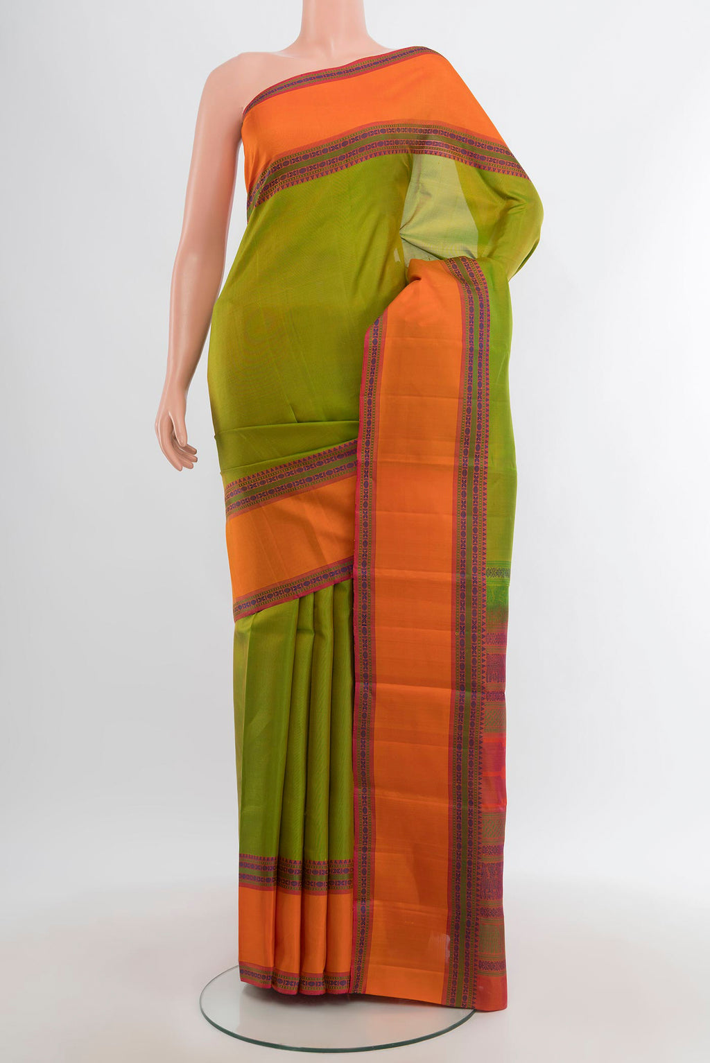 Green Kanchipuram Silk Saree with Plain Body and Thread Border.  displayed on a mannequin